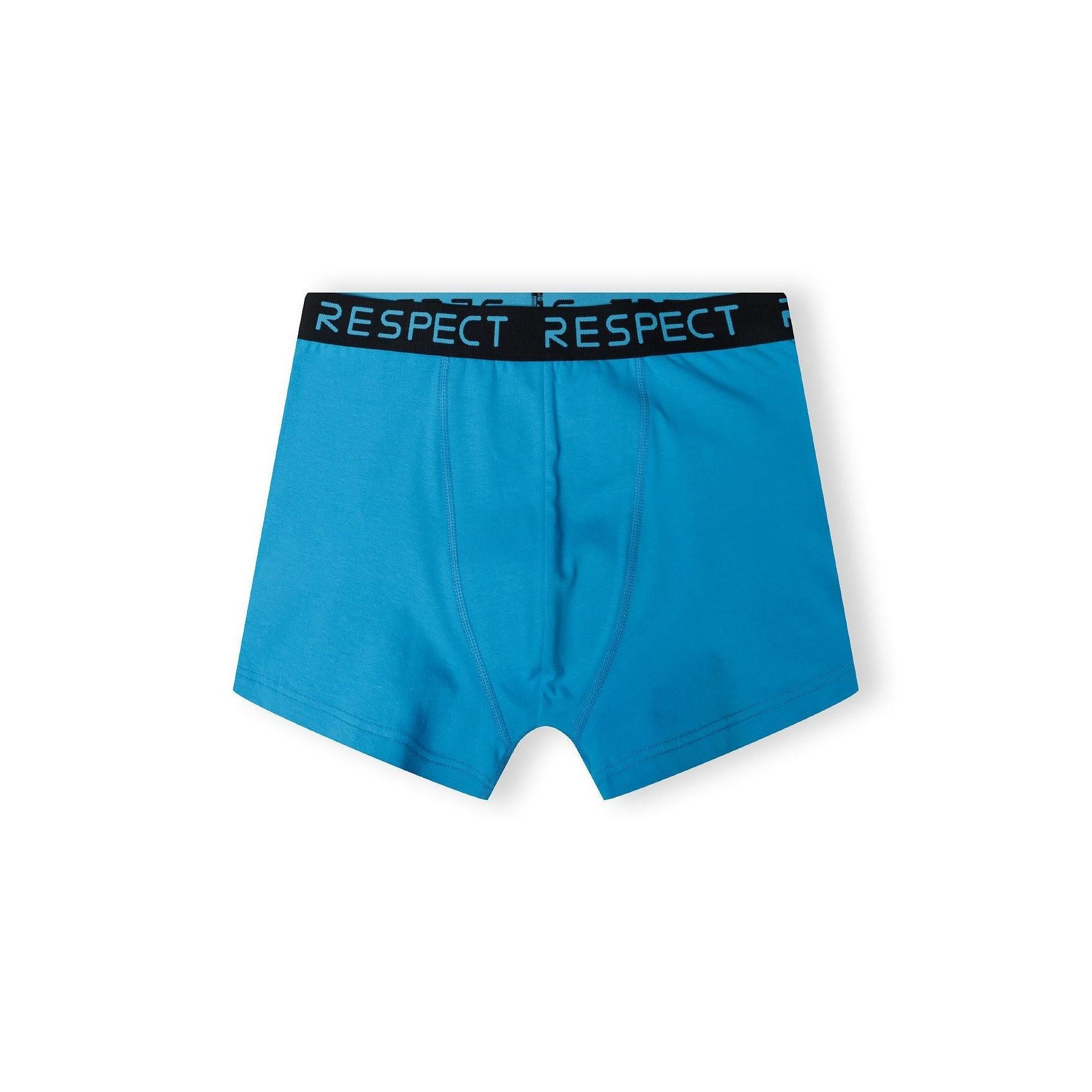 Single yellow cotton boxer shorts with black RESPECT branded elastic waistband displayed flat on white background showing front view