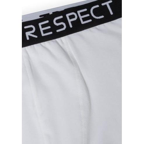 Close-up detail of black elastic waistband with white RESPECT lettering and white fabric showing stitching quality and brand detail