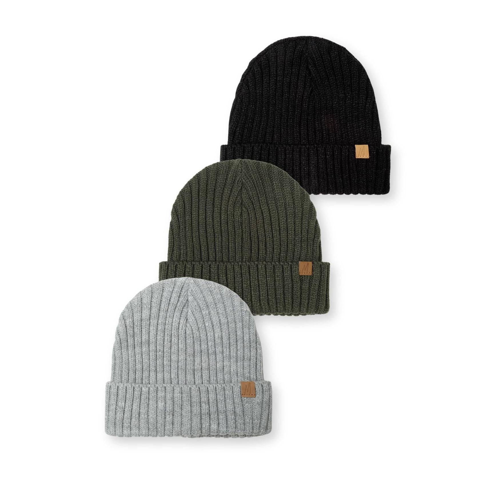 Three ribbed knit beanies arranged on white background showing black, olive green and grey colours with leather-look tab details and folded cuffs