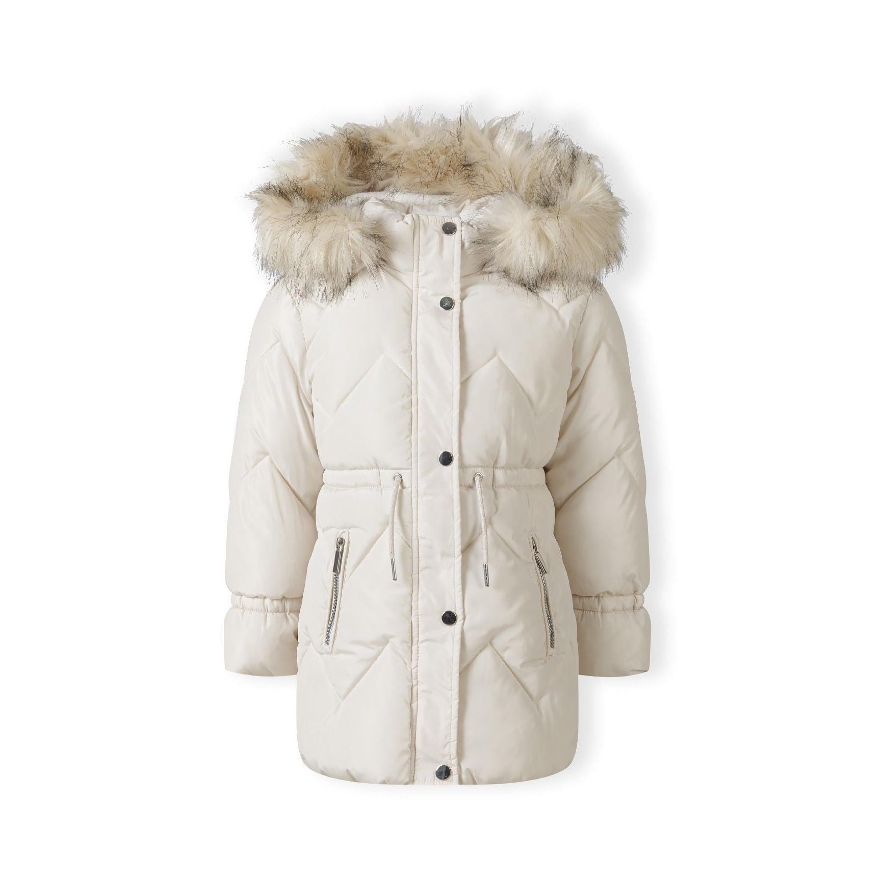 Cream quilted parka jacket laid flat showing full-length zip, snap button storm flap, zippered pockets and detachable faux fur hood trim on white background