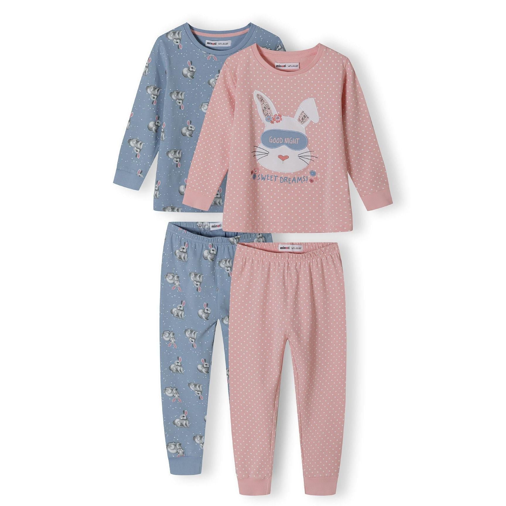 Flat lay view of pink polka dot pyjama set showing long sleeve top and matching bottoms with ribbed cuffs