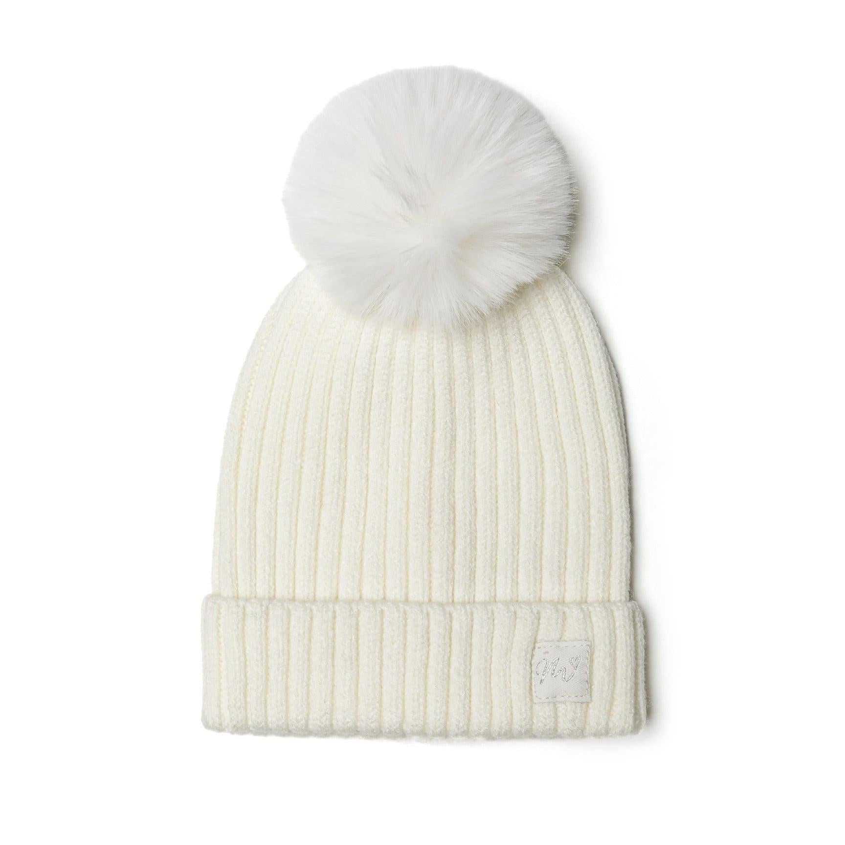 Cream ribbed beanie with white fluffy pom pom on white background, showing front view with lurex badge detail and fold-up cuff