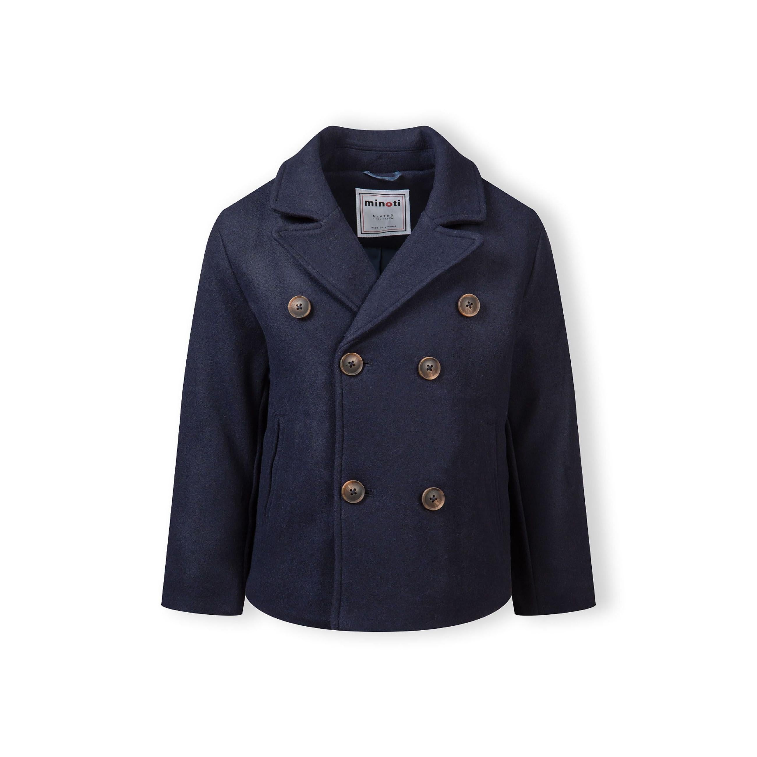 Back view of navy double breasted coat showing lapel collar construction and tailored fit on white background