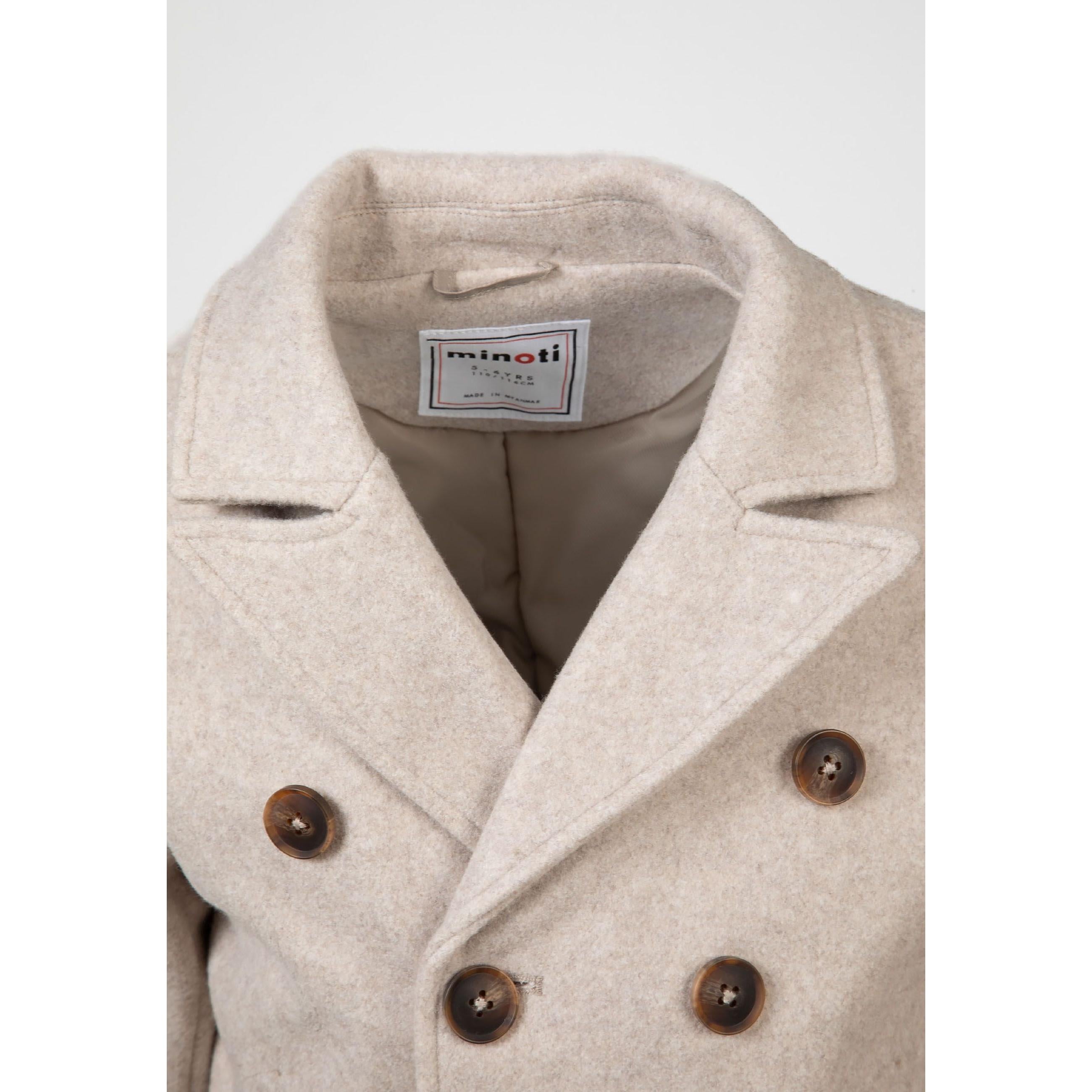 Close-up detail of grey coat collar showing Minoti brand label and brown button arrangement