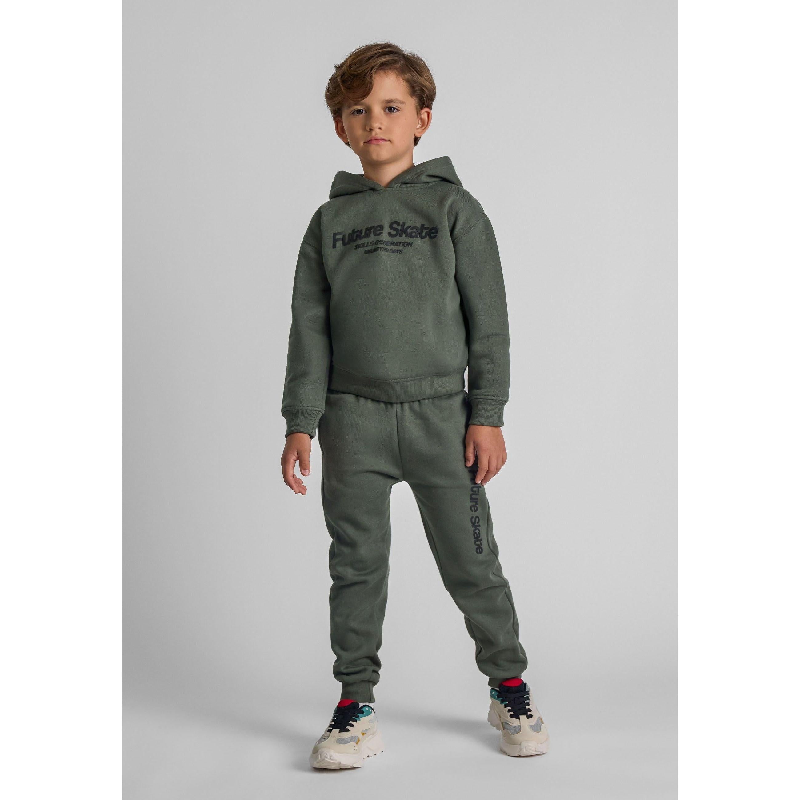 Young boy wearing khaki green hoodie and matching jogger pants set with Future Skate print, standing against grey background
