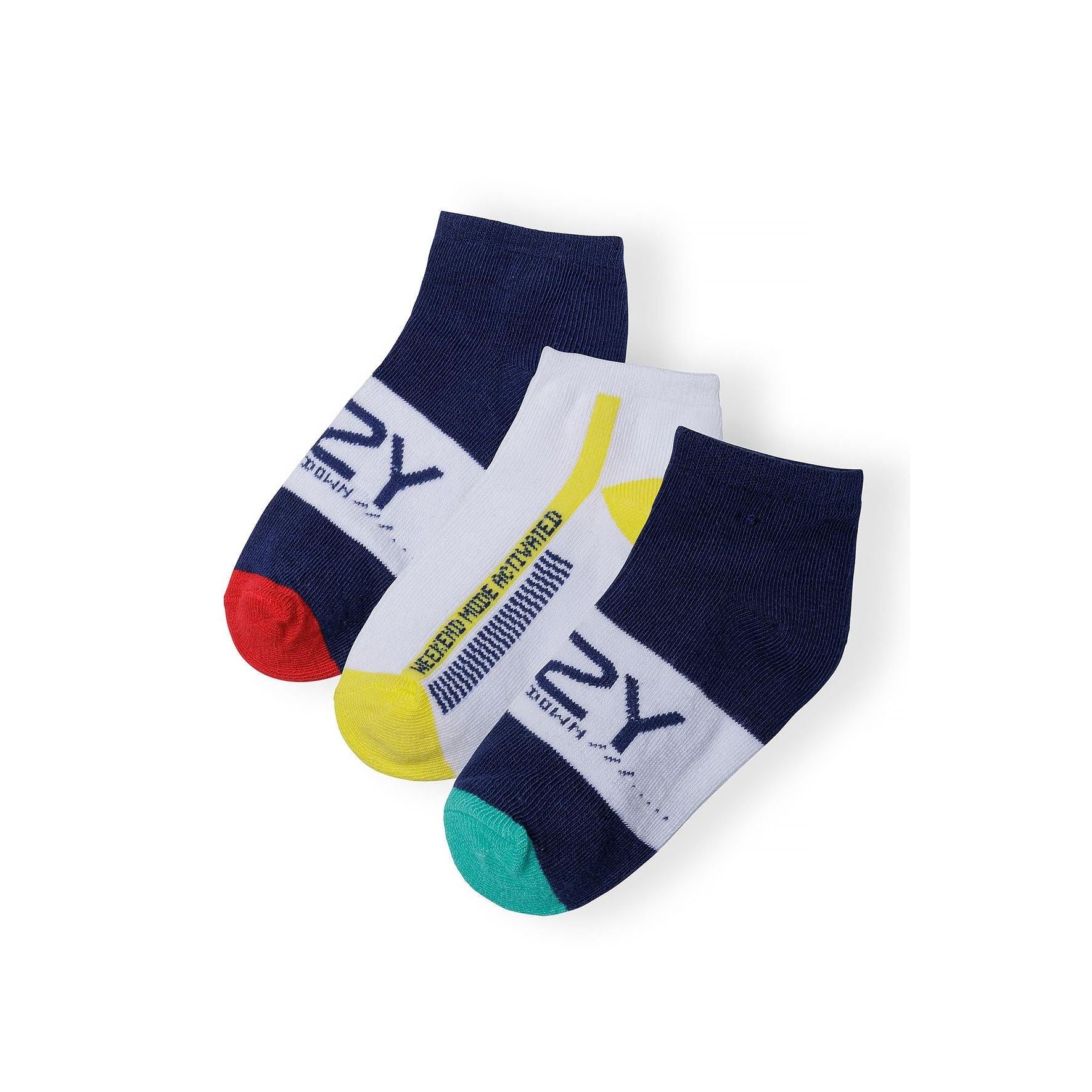 Three trainer socks in navy, white and multicolour with striped patterns, slogan prints and contrasting heel and toe details displayed on white background