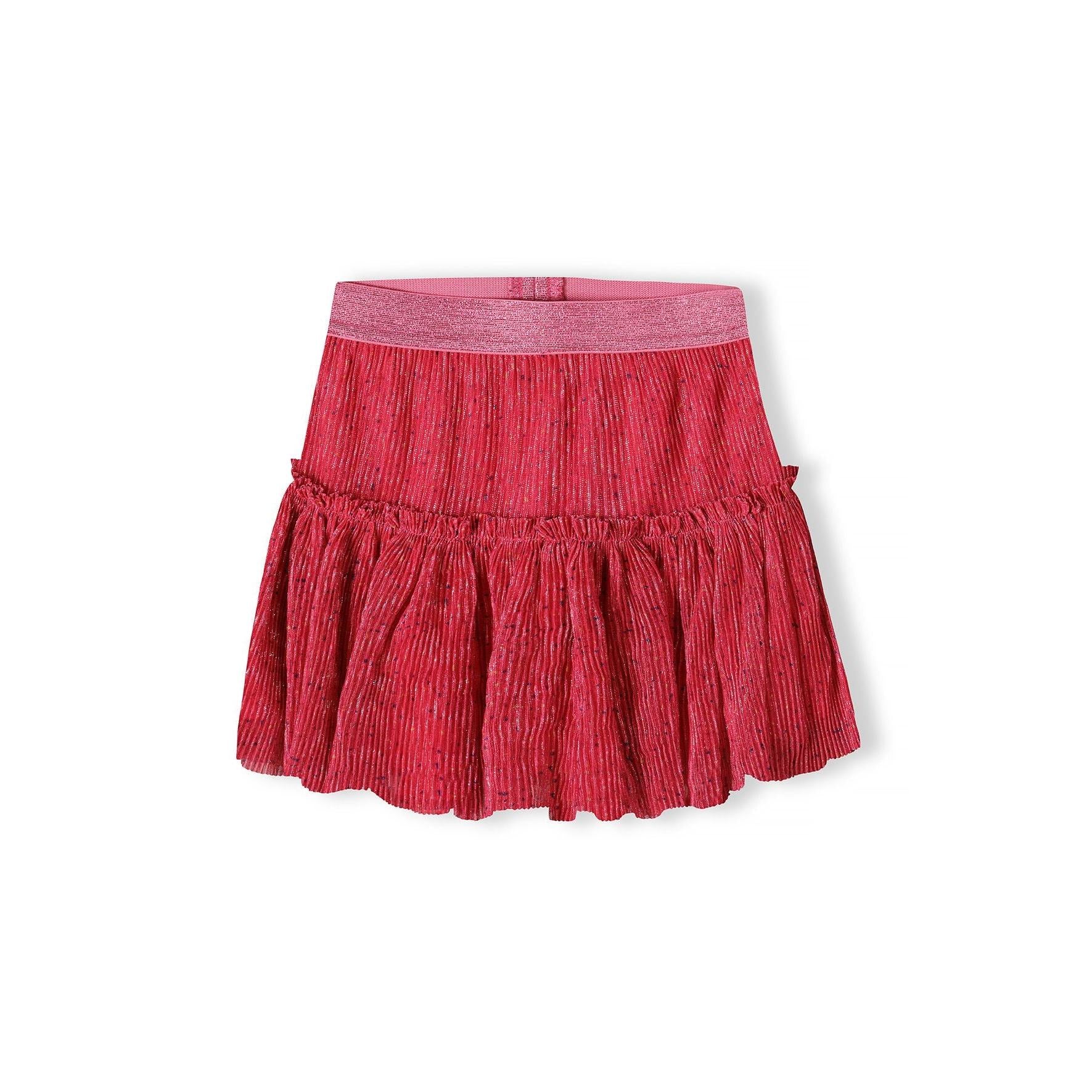 Pink sparkly pleated party skirt on white background showing tiered ruffle construction and glittery waistband