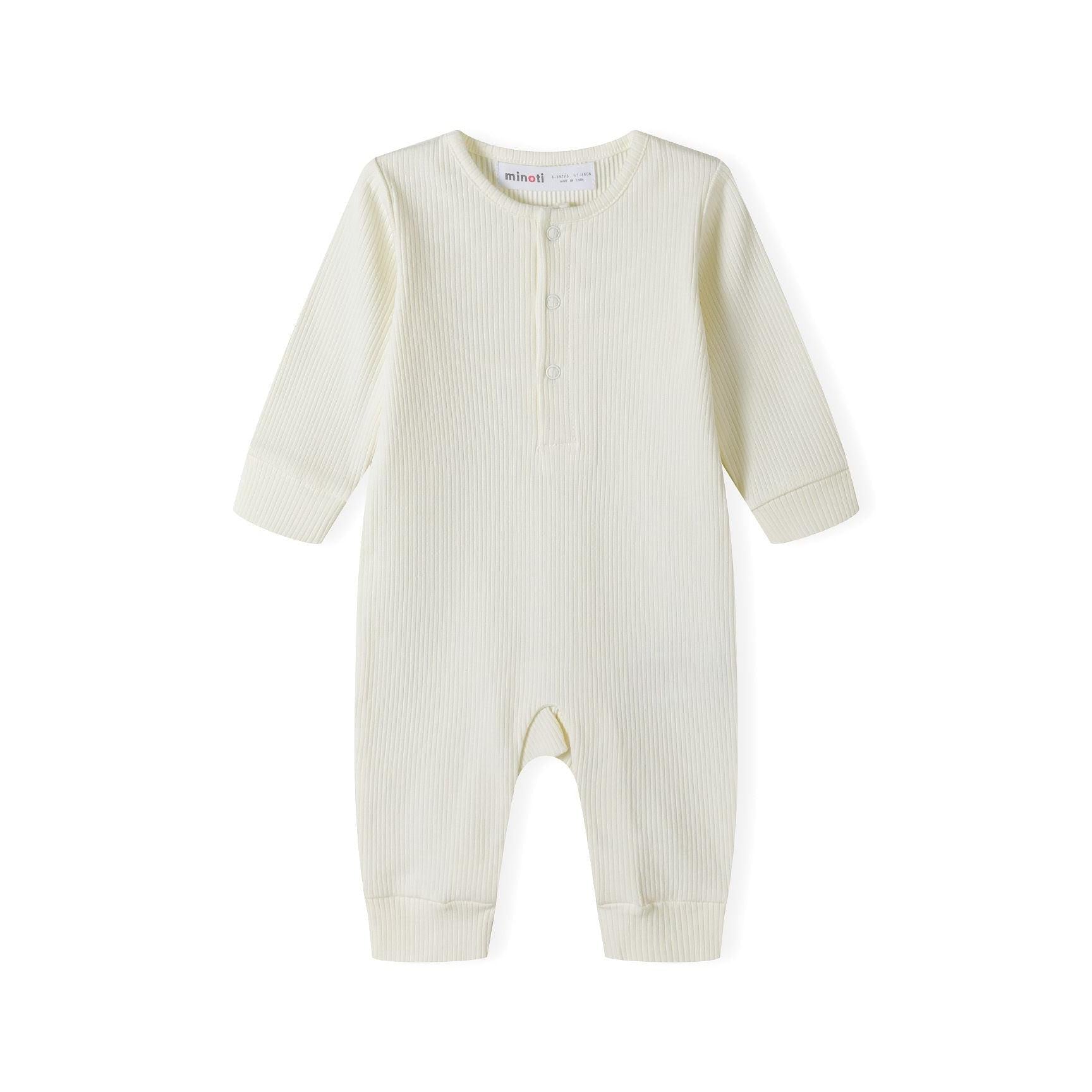 Close-up detail of sage green ribbed romper displaying Minoti brand label and front snap button closure design