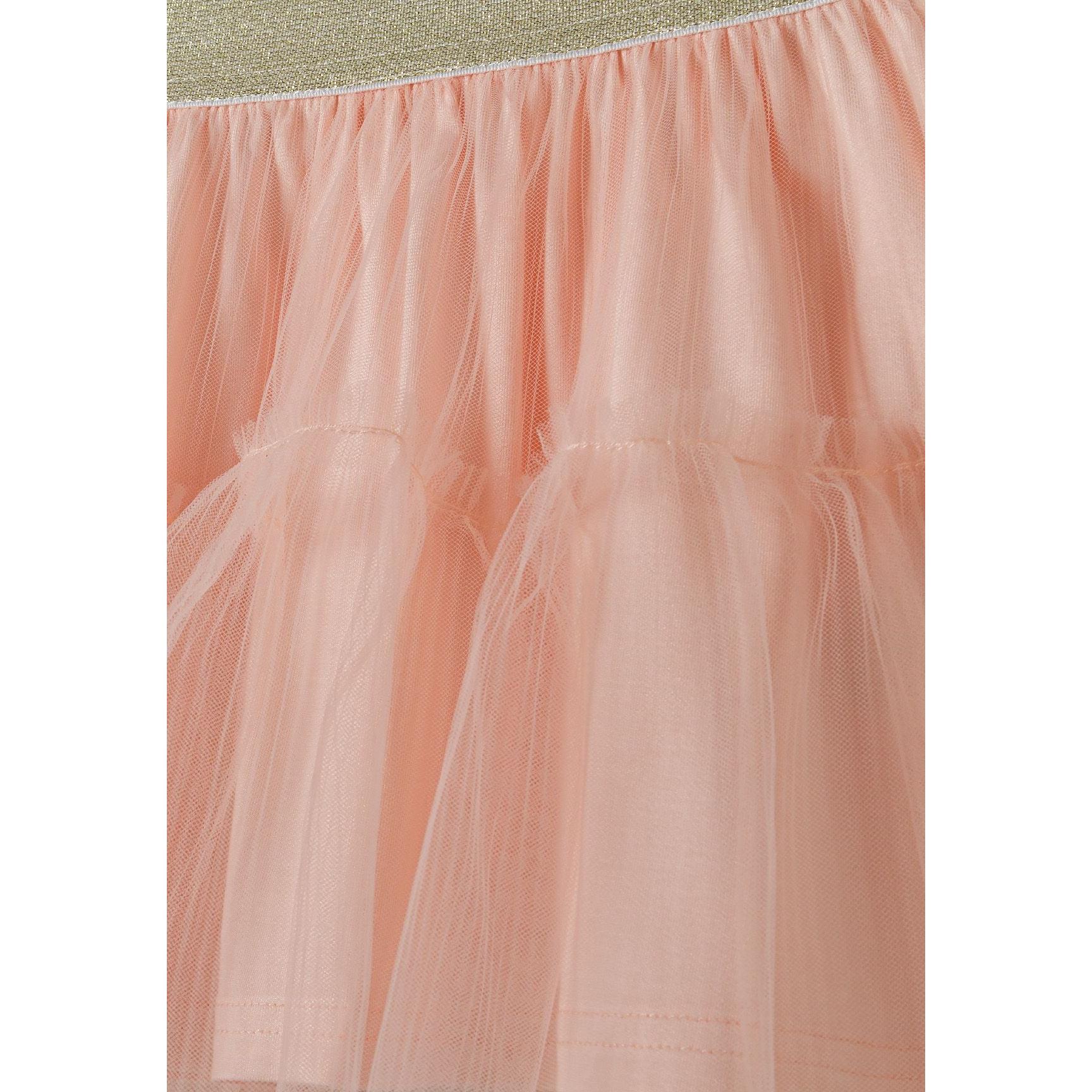 Close-up detail of orange tulle fabric texture and sparkly gold elasticated waistband showing quality construction and comfortable stretch fit
