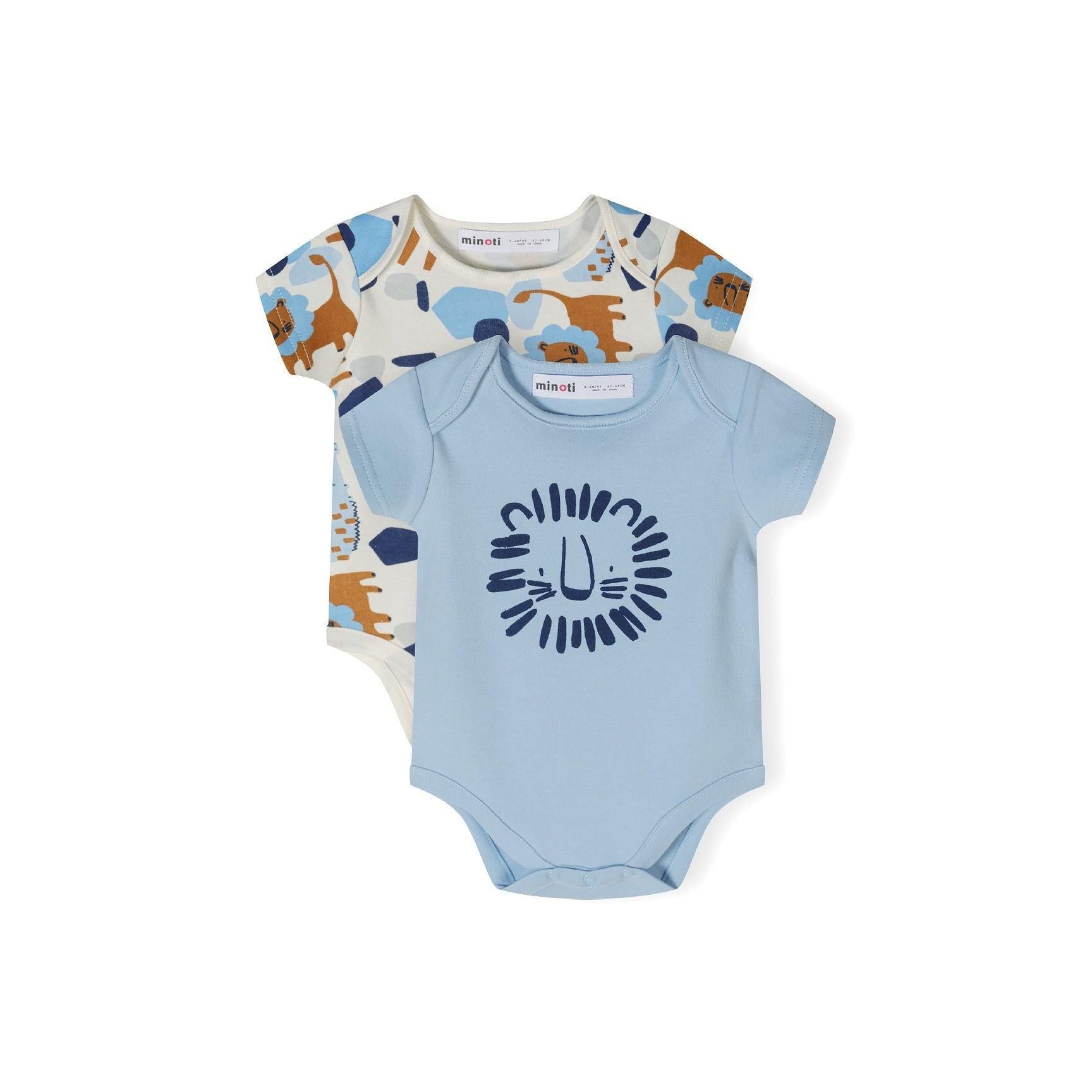 Two baby bodysuits displayed flat - one light blue with navy lion graphic, one cream with colorful safari animals including elephants and giraffes