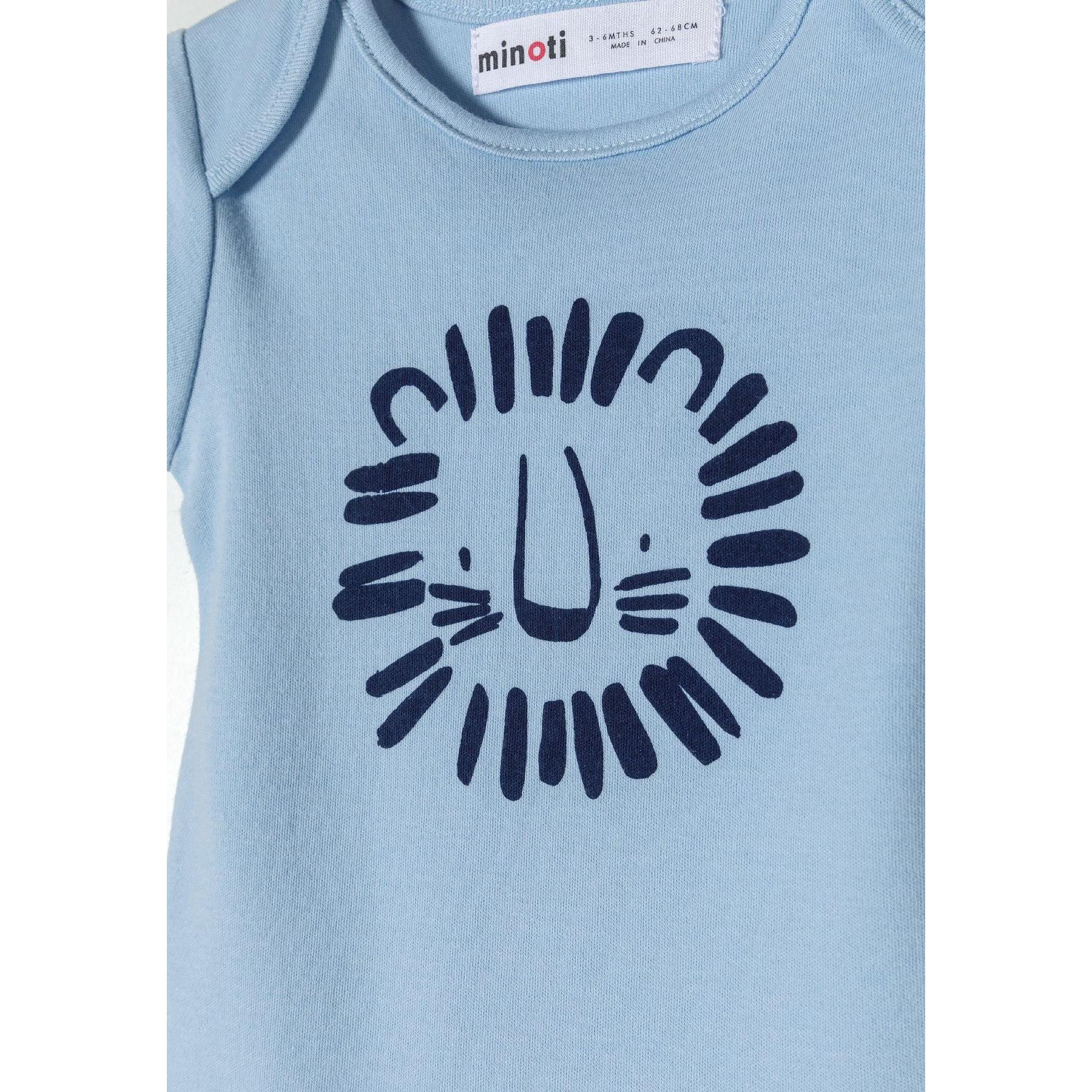 Detail shot of light blue bodysuit showing navy lion face graphic with radiating mane design and Minoti label visible at neckline