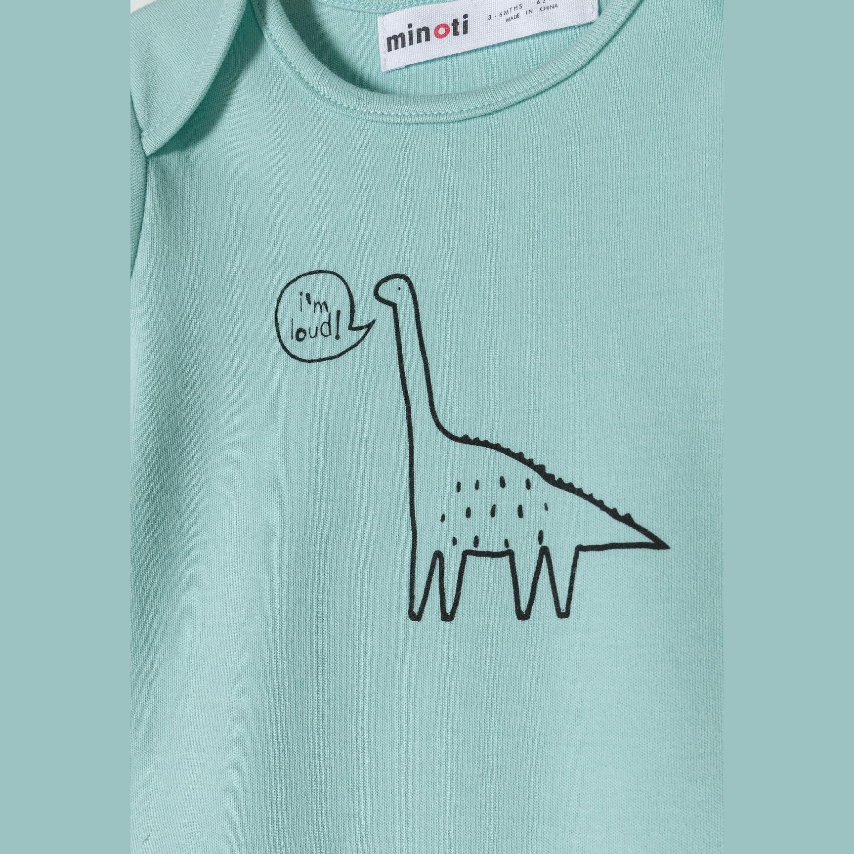 Close-up detail of mint green bodysuit showing dinosaur print with 'i'm loud!' speech bubble and Minoti label at neckline