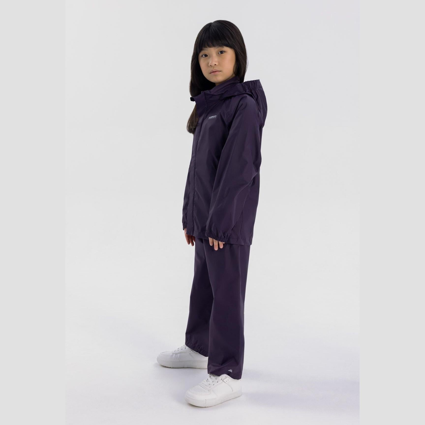 Purple waterproof overpants laid flat showing elasticated waistband and full-length design, product shot against white background