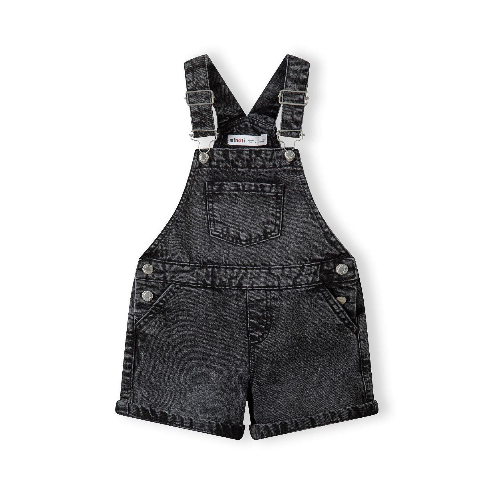Back view of black denim dungarees showing adjustable straps and rear pockets on white background