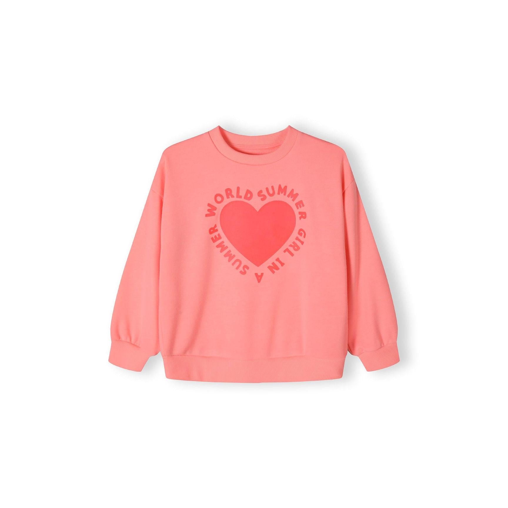 Back view of coral crew neck sweatshirt showing plain design with ribbed cuffs and hem against white background