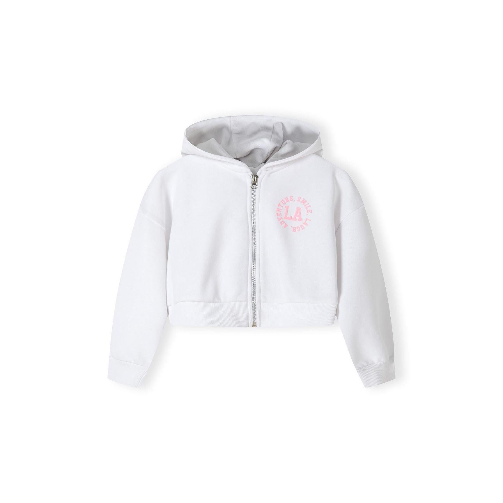 Close-up detail of white shorts showing pink circular L.A. logo with 'SMILE' text around the border