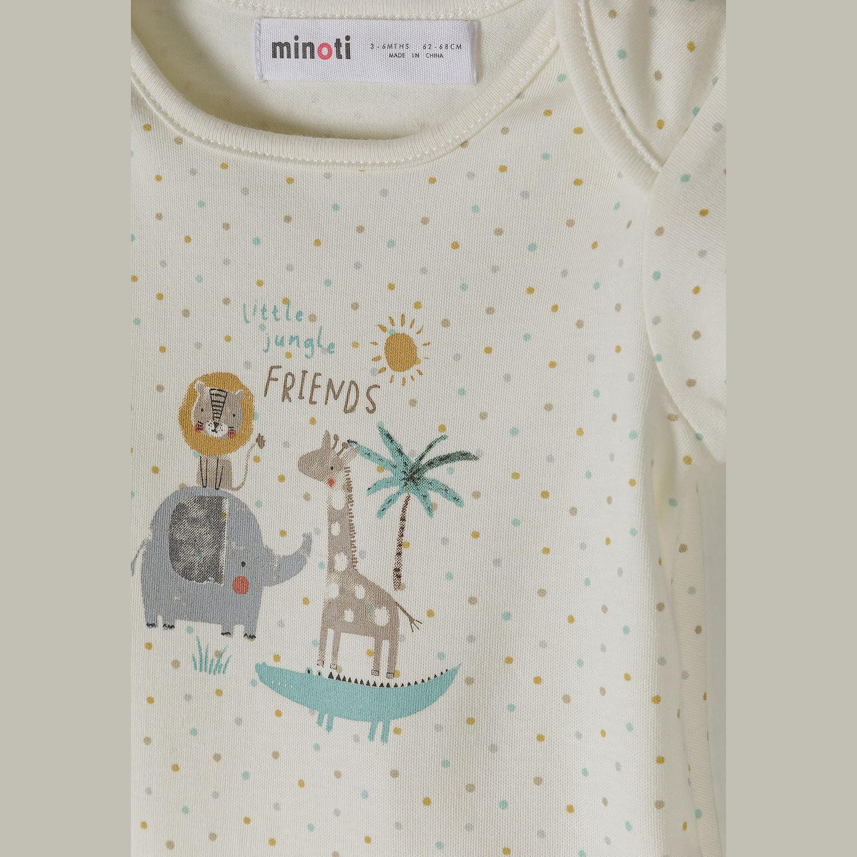 Close-up detail of cream bodysuit with colorful polka dots and safari print showing elephant, giraffe, lion, palm tree and 'Hello jungle FRIENDS' text with sun design