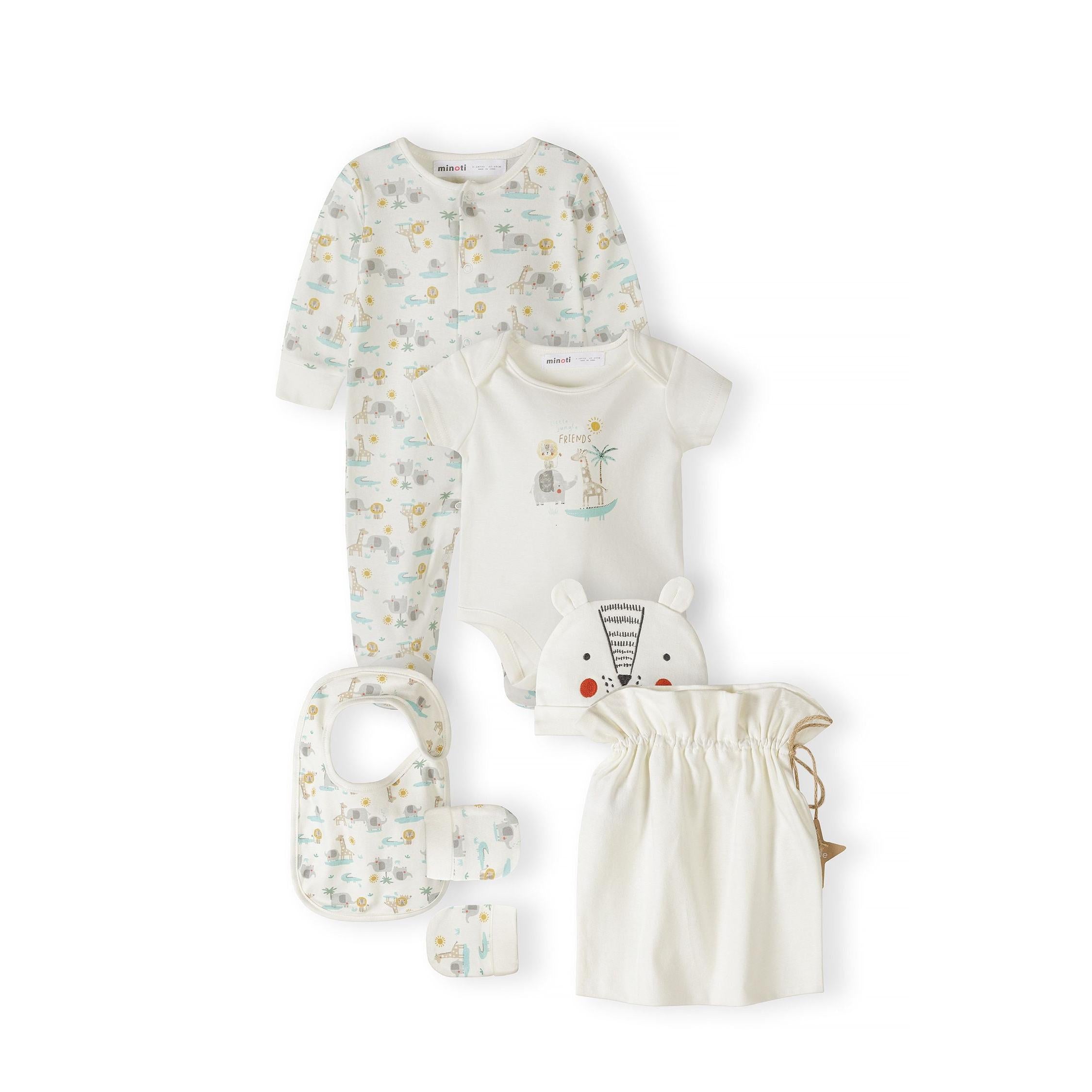 Close-up of cream cotton baby hat with embroidered bear face design featuring black eyes, orange cheeks and striped nose detail with small ears