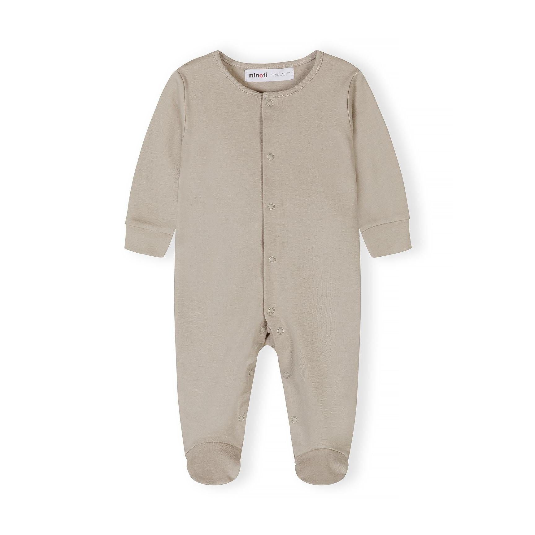 Single cream-colored baby sleepsuit with long sleeves and snap button closure shown flat against white background with Minoti branding