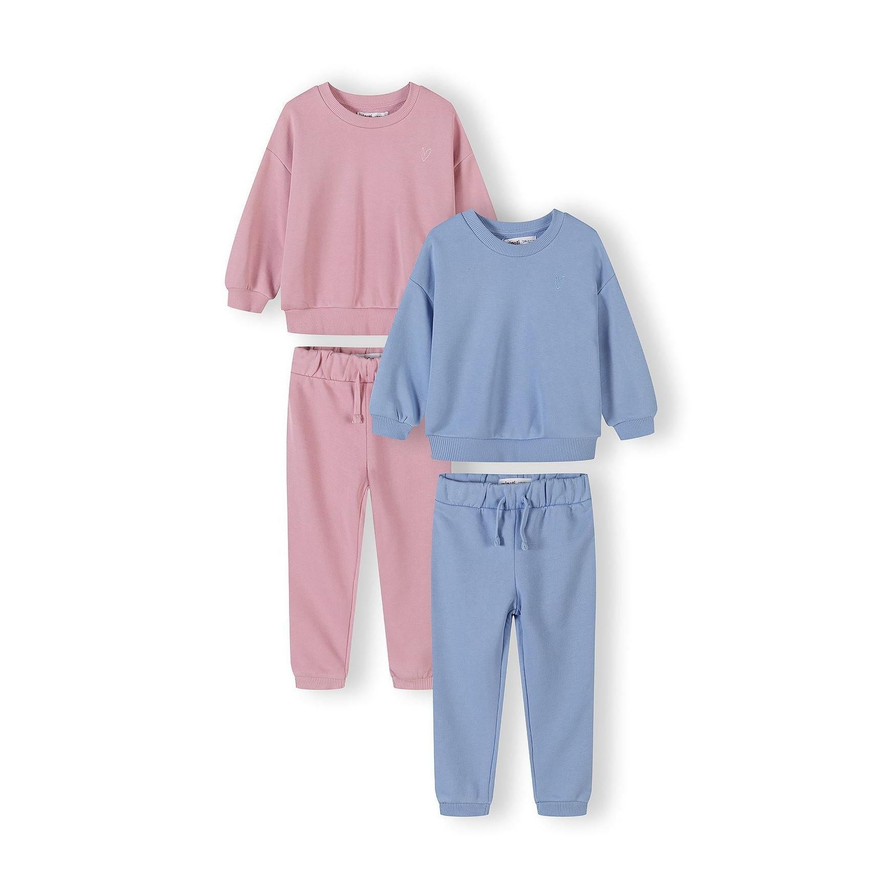 Two complete tracksuit sets displayed on white background, featuring pink crew neck sweatshirt with matching joggers and blue crew neck sweatshirt with matching joggers