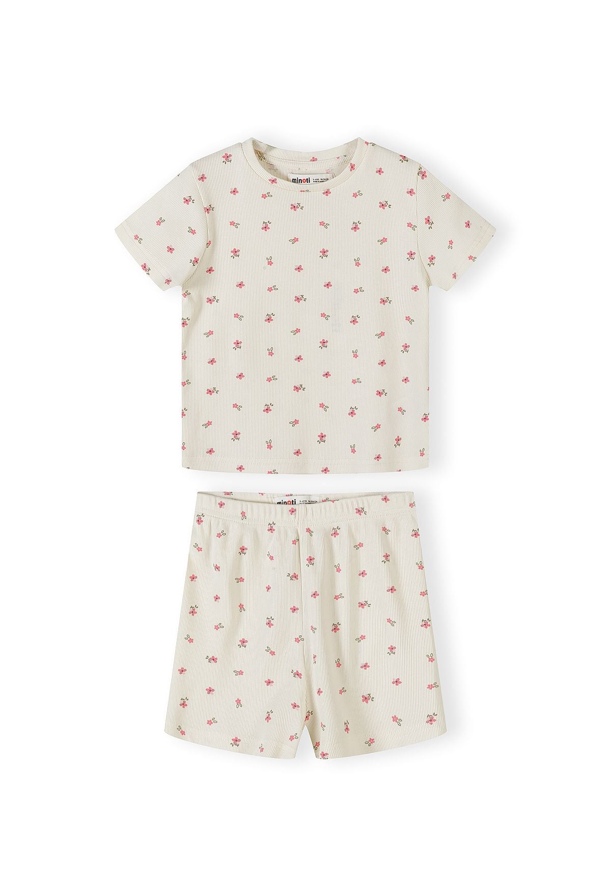 Close-up of pink ribbed pyjama set with small floral print pattern showing top and matching shorts