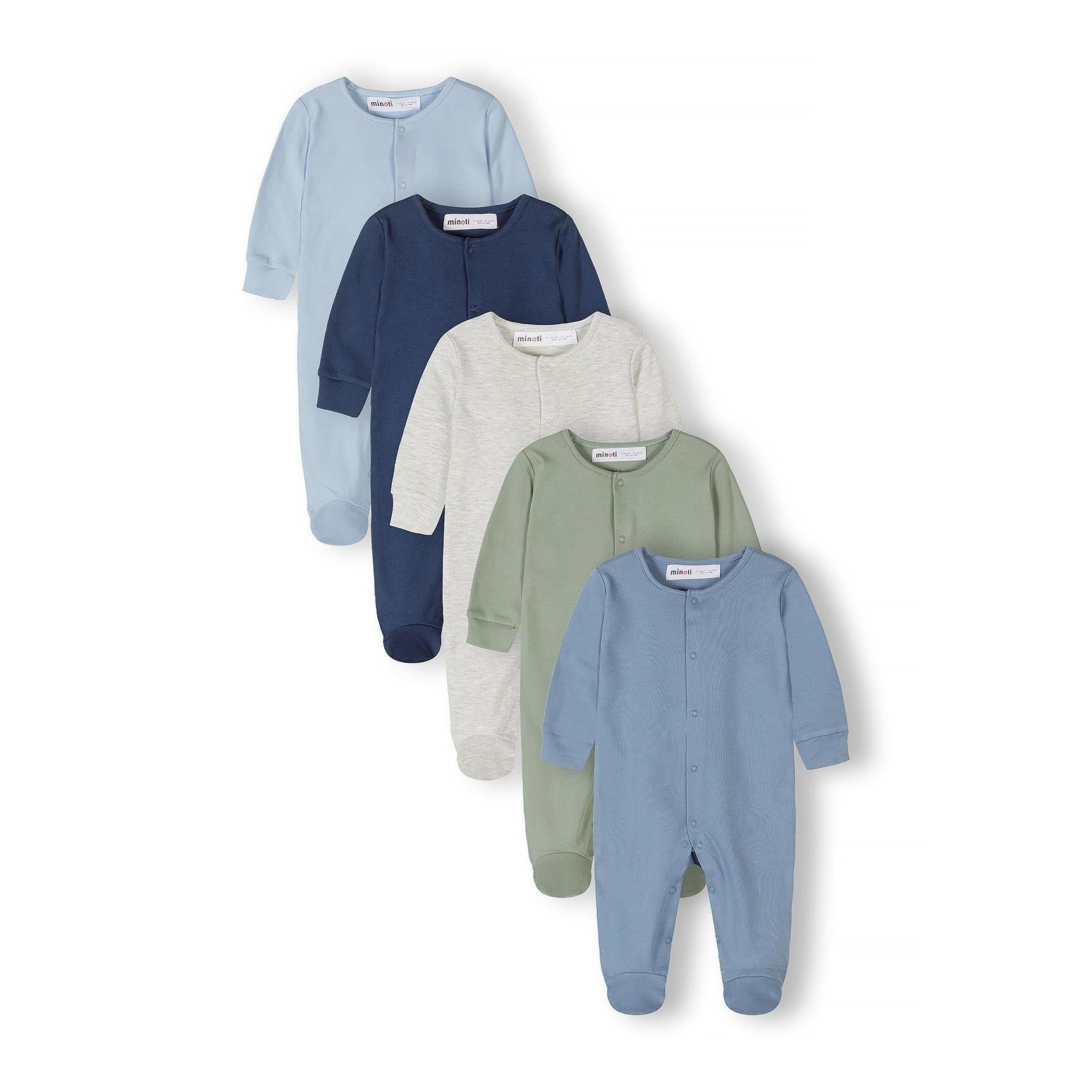 Five cotton sleepsuits arranged in a fan display showing light blue, navy, grey, sage green and medium blue colours with white Minoti labels