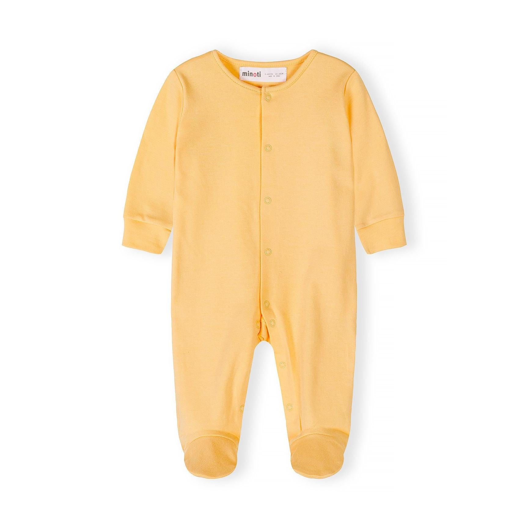 Single yellow baby sleepsuit laid flat showing front view with Minoti label visible at neckline and snap button closures down the front on white background