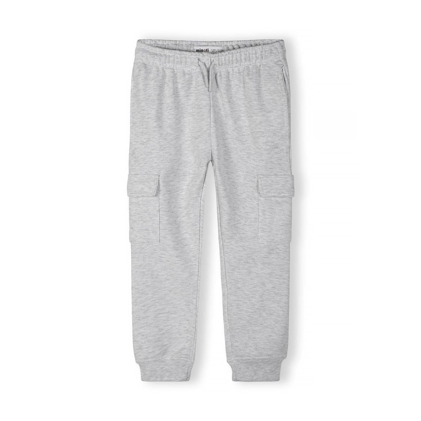 Close-up detail of light grey cargo joggers showing ribbed waistband texture and fabric quality on white background
