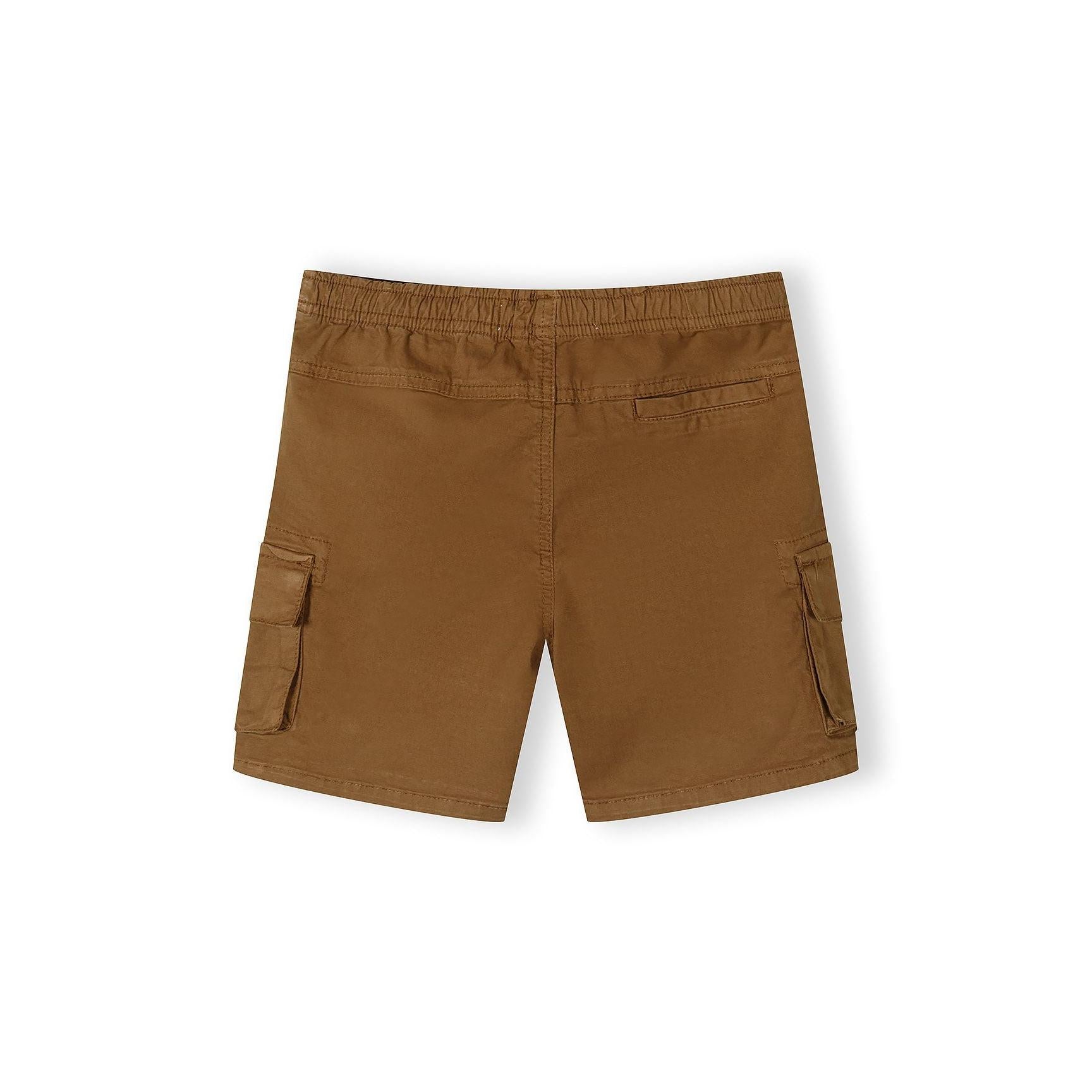 Close-up detail of camel brown combat shorts showing drawstring waist with black and white striped cord and elastic waistband construction
