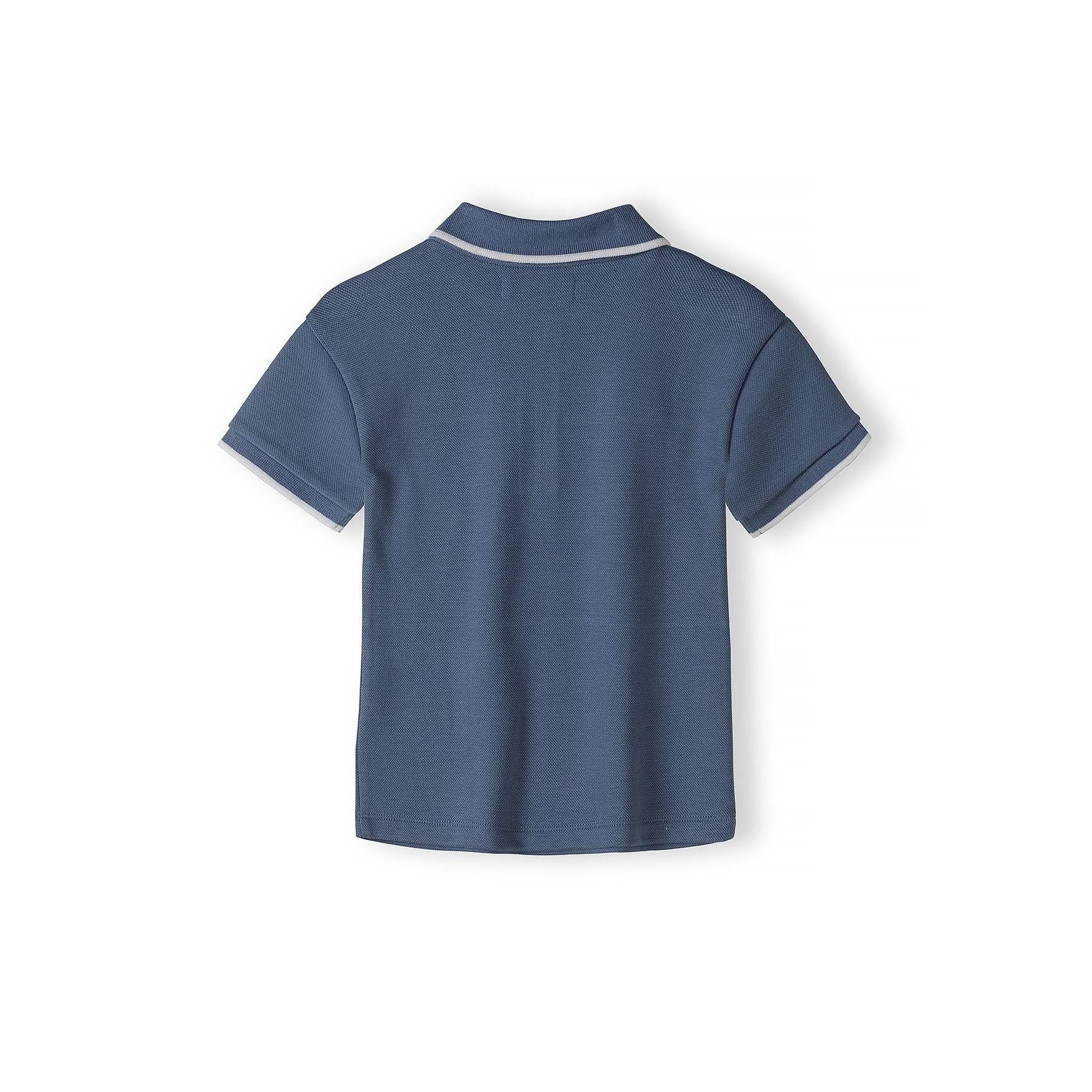 Back view of navy blue pique polo shirt showing plain design and collar detail against white background