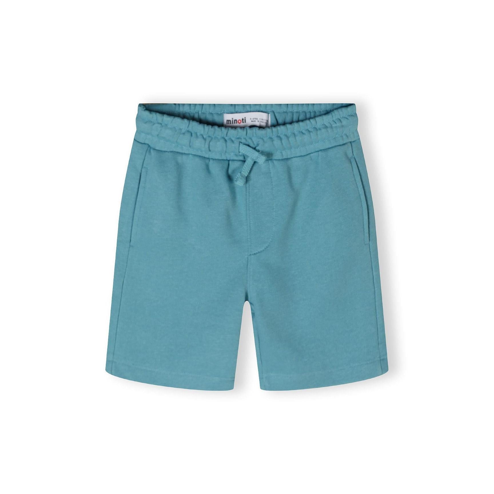 Teal sweatshirt fabric shorts with elasticated waistband laid flat on white background