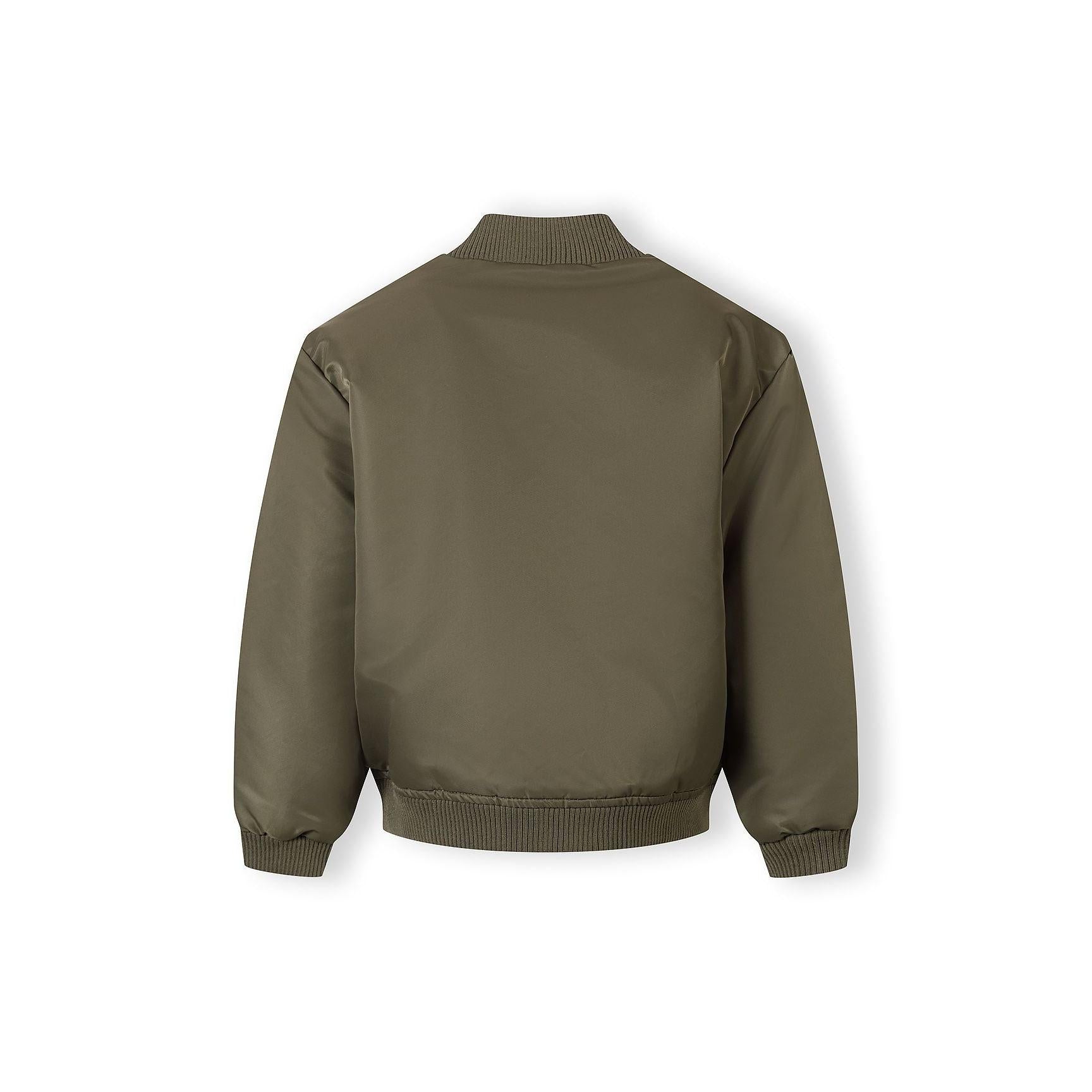 Close-up detail of khaki bomber jacket showing quilted padding texture and stitching construction