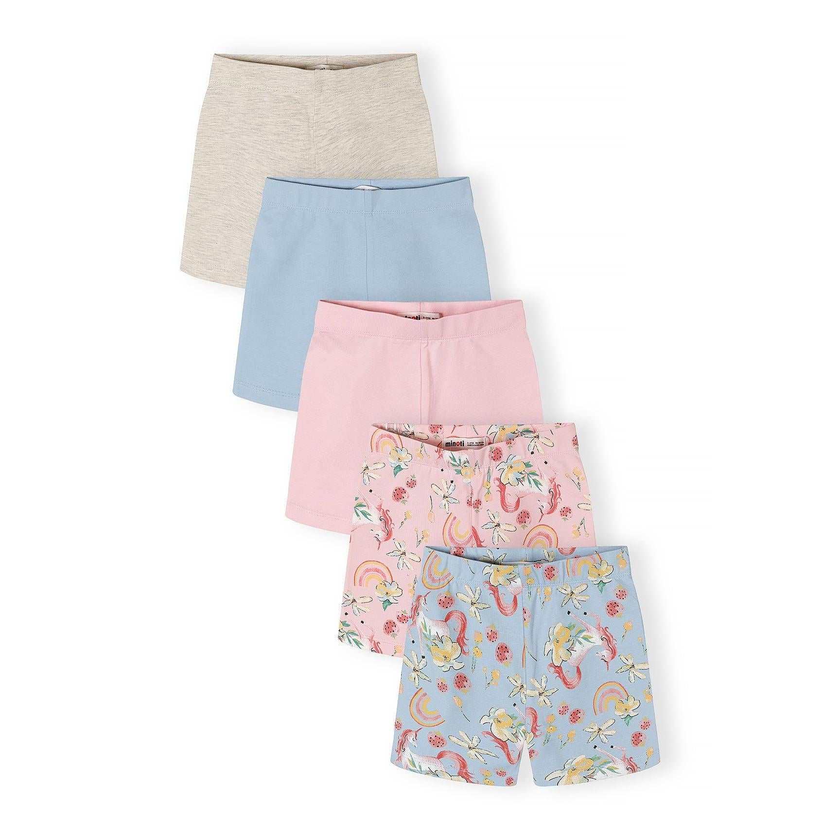 Five cycle shorts laid out in a fan arrangement showing beige, light blue, pink, and two unicorn print designs with rainbows and flowers on white background