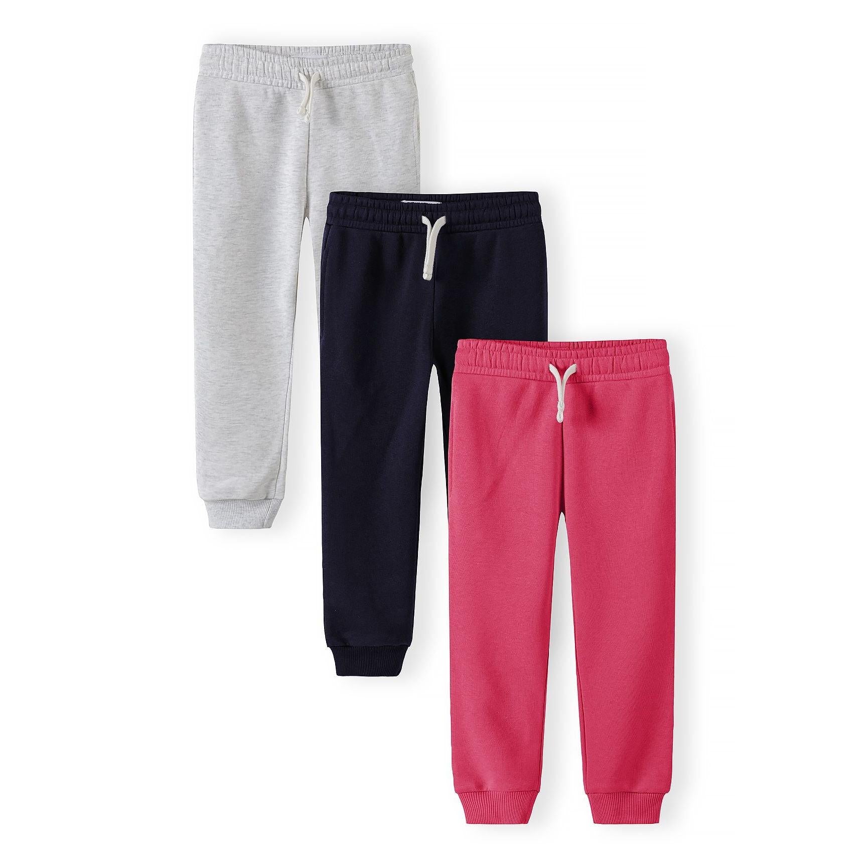 Three joggers laid flat showing navy, pink and grey colours with drawstring waistbands and ribbed cuffs on white background