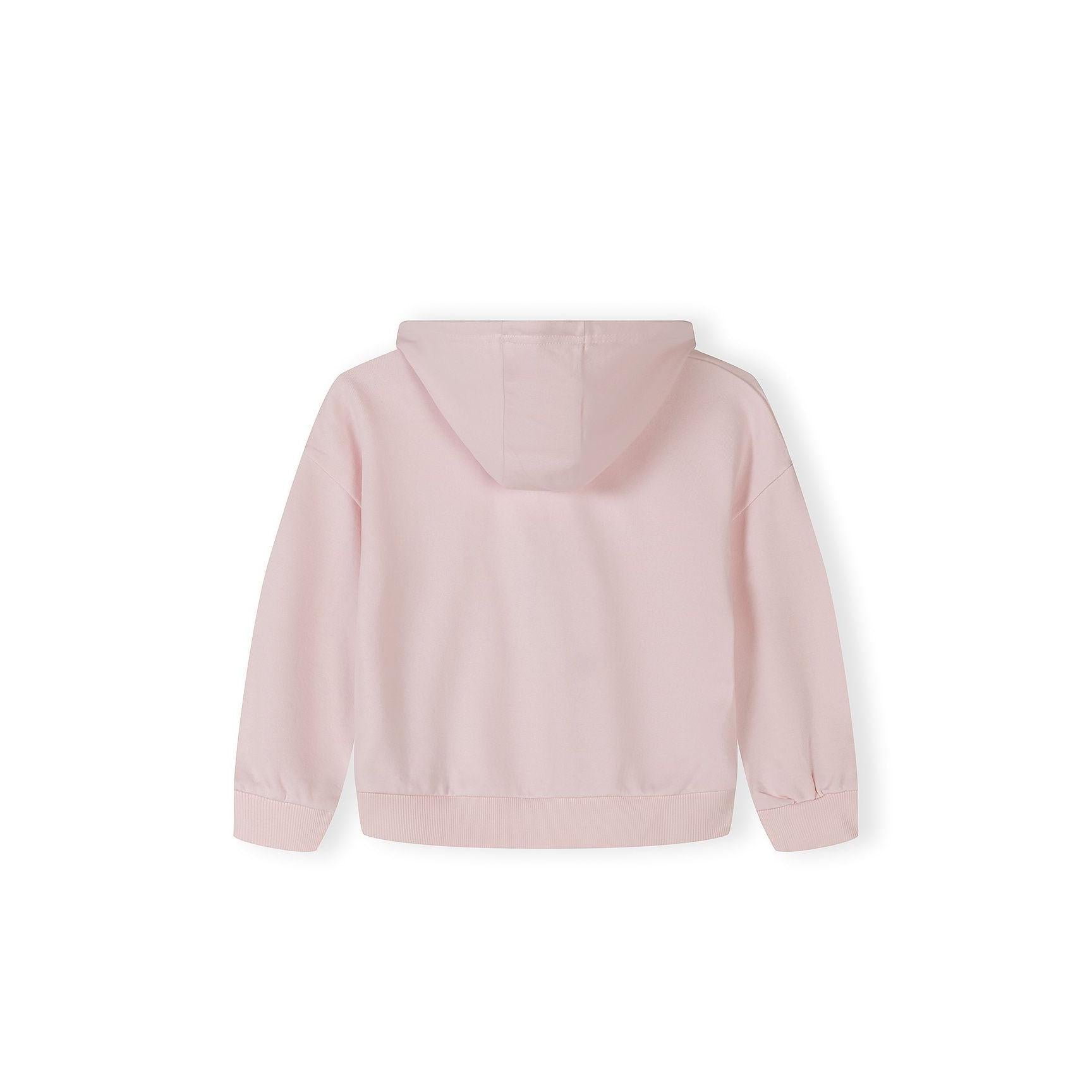 Close-up detail of light pink joggers showing elasticated waistband, side pocket and Tennis Camps print on leg