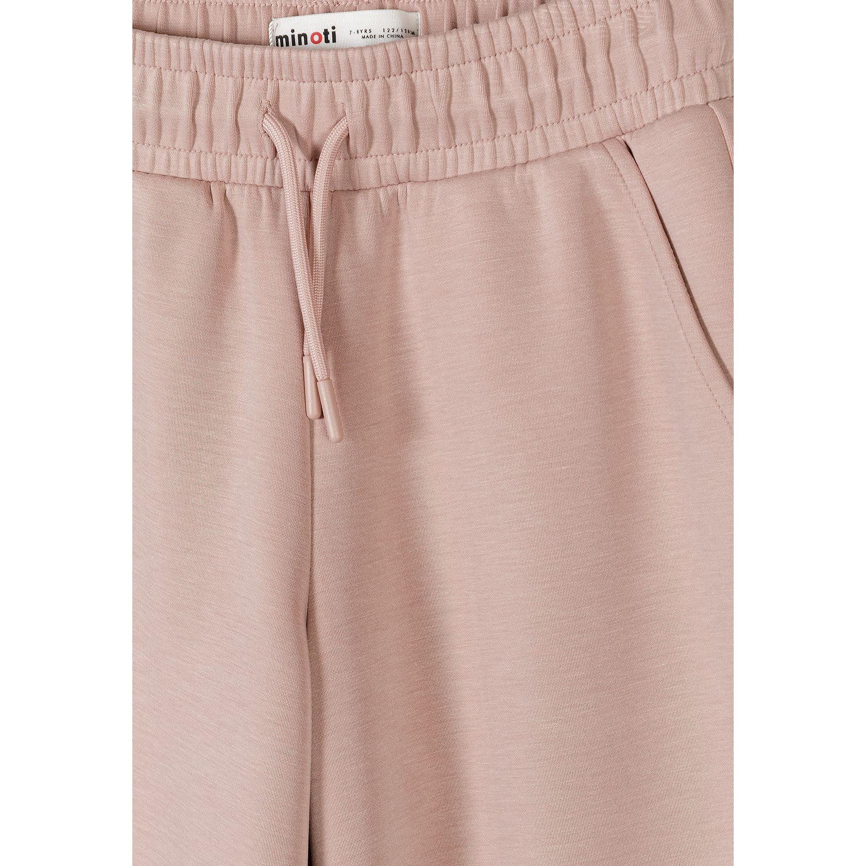 Close-up detail of pink joggers waistband showing elasticated construction, drawstring ties and Minoti brand label
