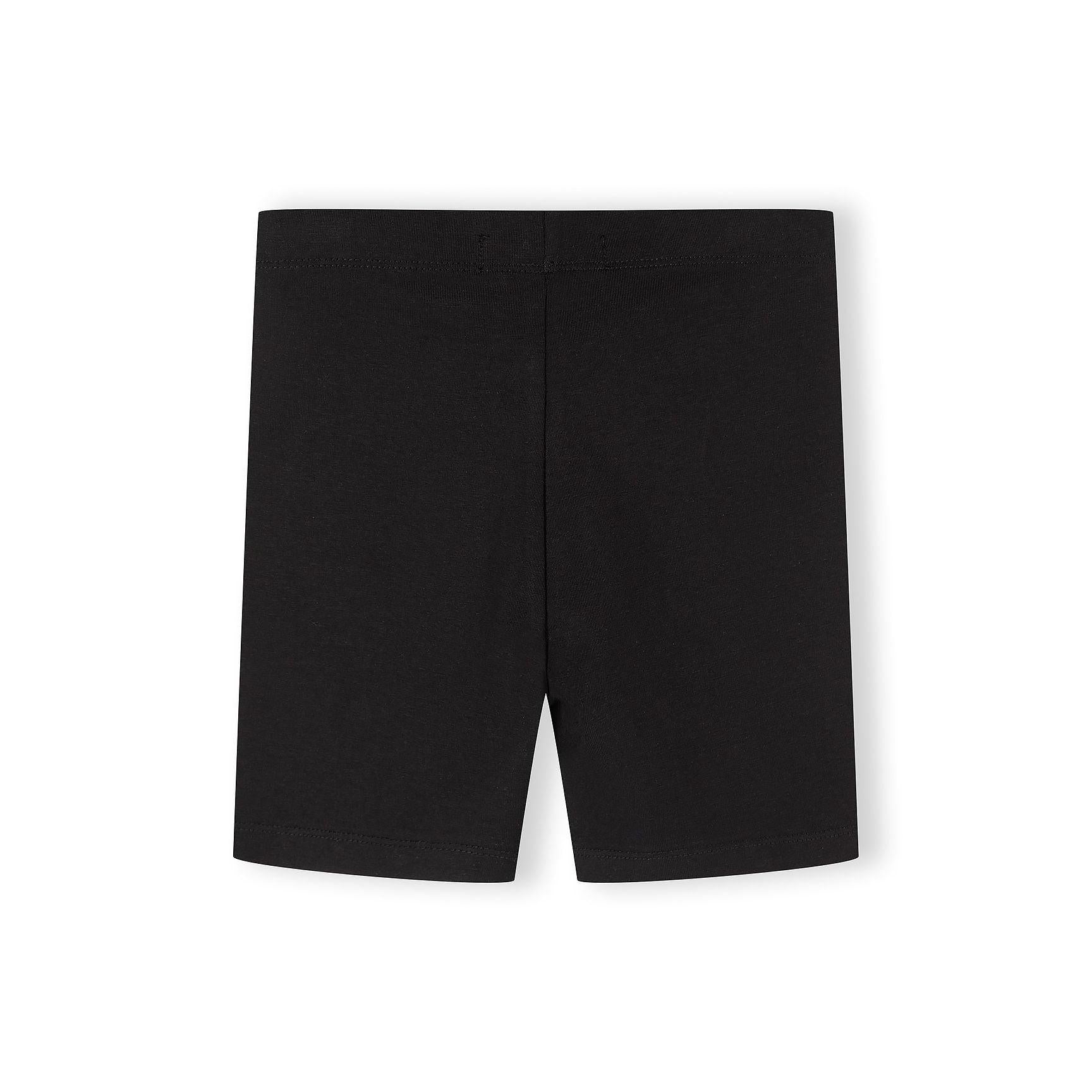 Single black cycling shorts laid flat showing full length and elasticated waistband on white background