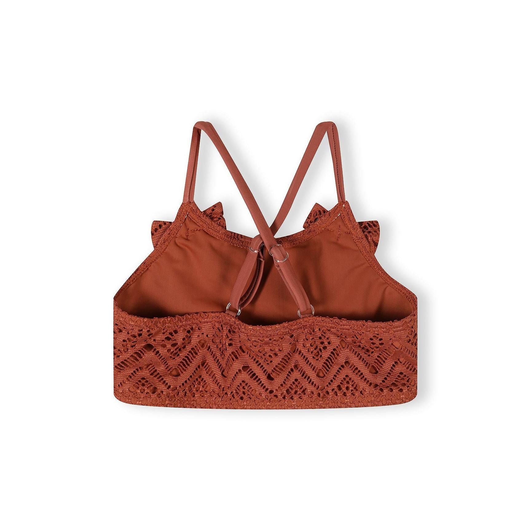 Back view of copper crochet bikini top showing crossed adjustable straps and solid inner lining with decorative crochet exterior pattern