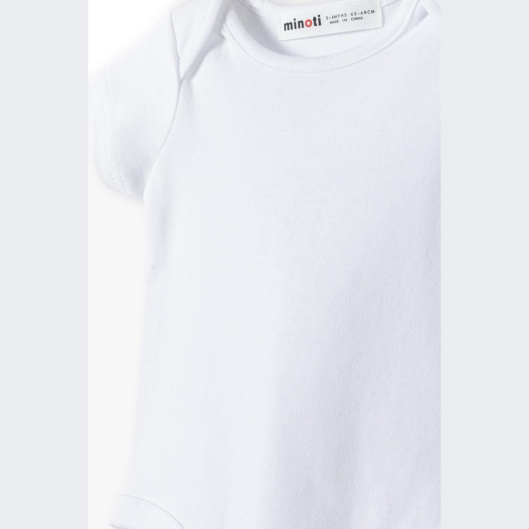 Close-up detail of white cotton bodysuit showing soft fabric texture and Minoti brand label at neckline