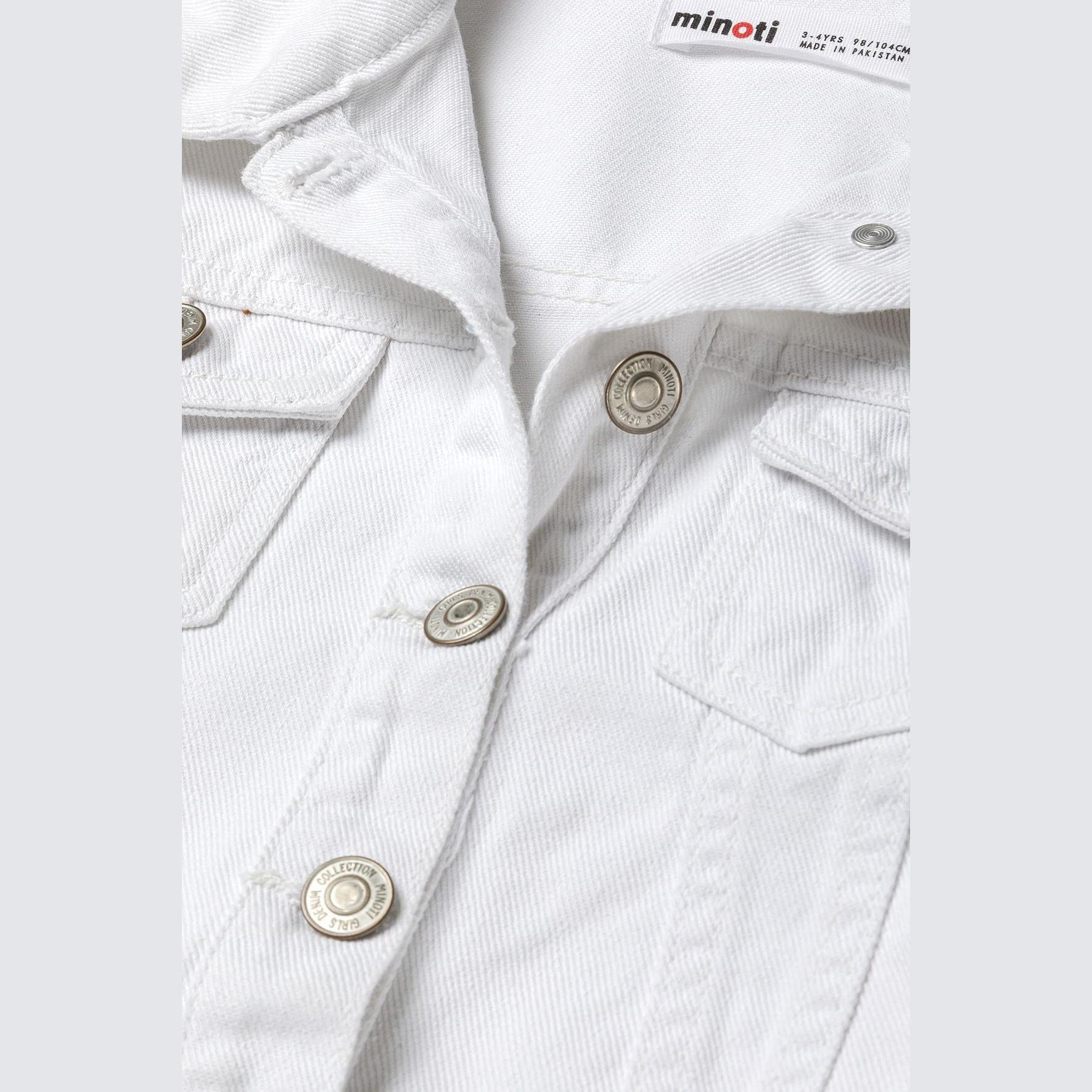 Close-up detail of white denim jacket showing front button closure, patch pockets and Minoti brand label