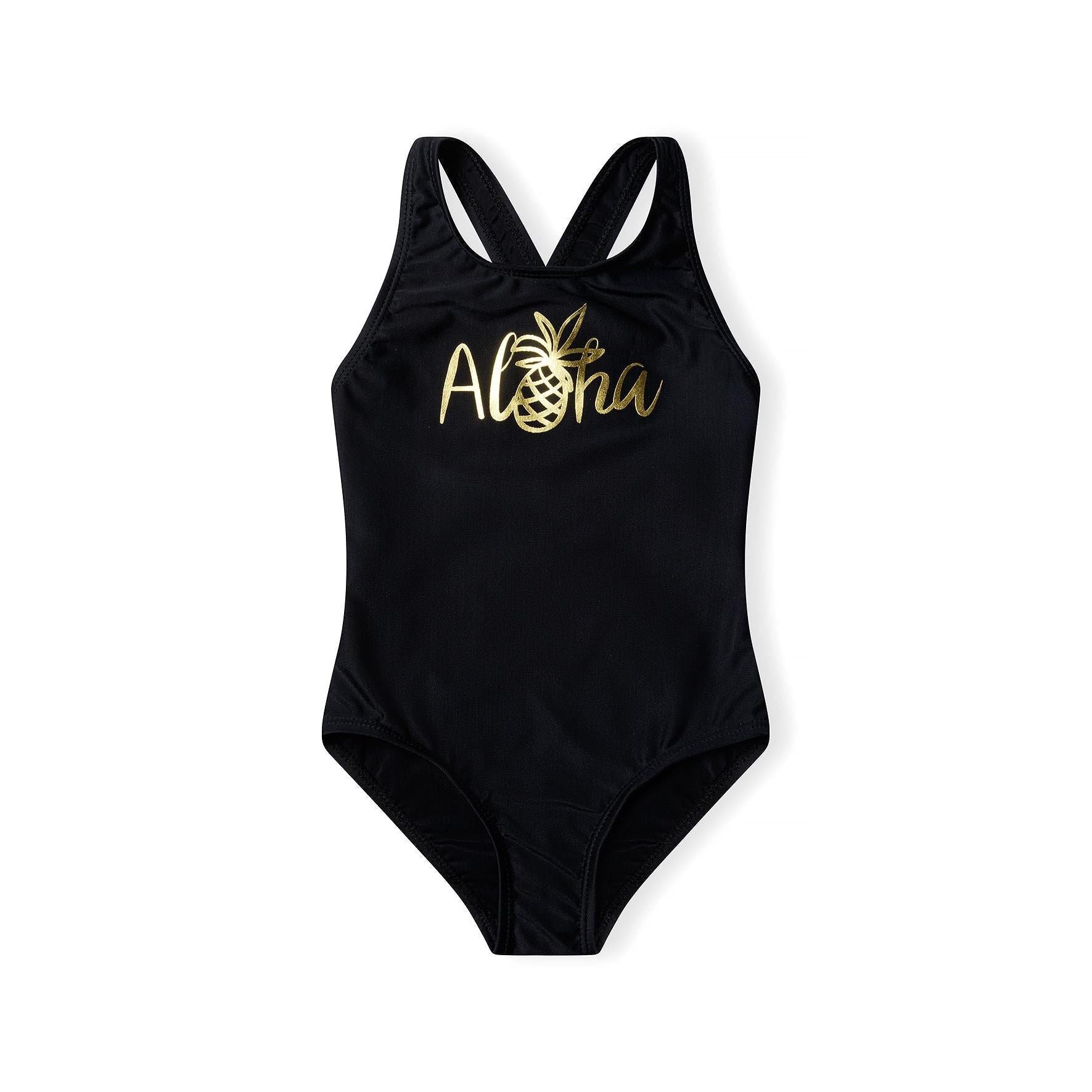 Black one-piece swimsuit with golden Aloha pineapple print on chest, crossed-back straps, displayed flat on white background