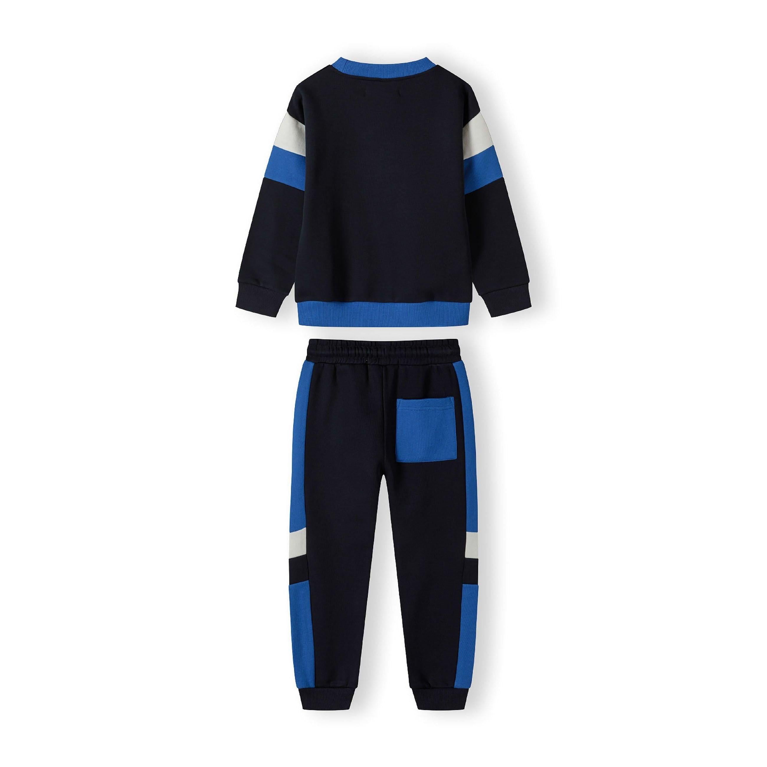 Close-up detail of navy jogger waistband with blue drawstring ties and side panel construction