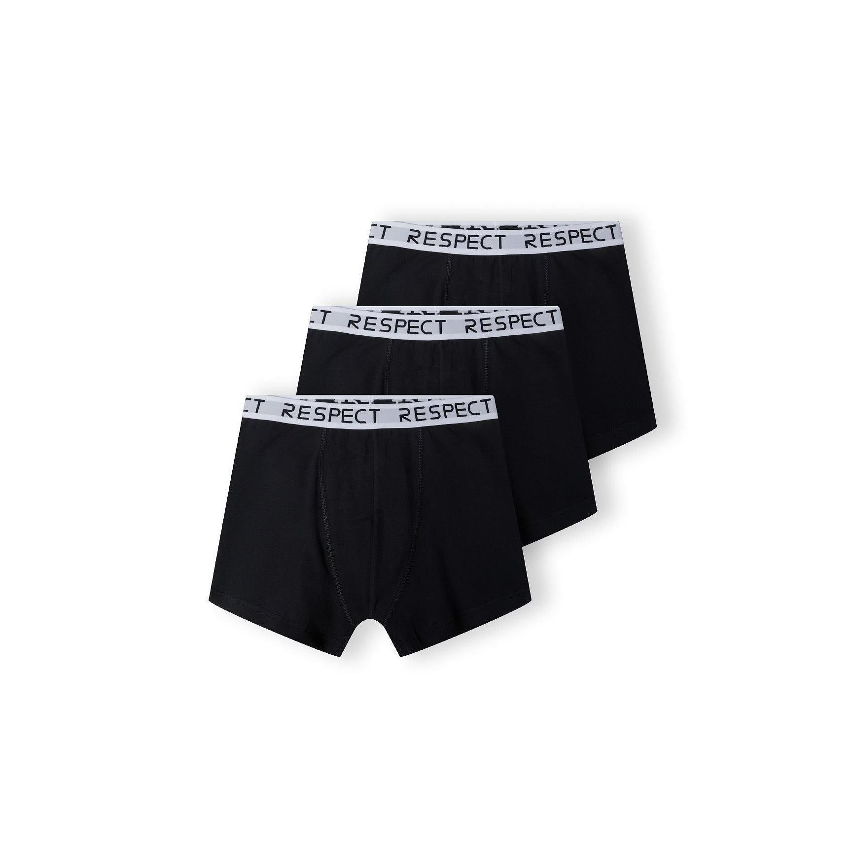 Three black boxers with white Respect logo waistbands arranged in overlapping fan layout on white background