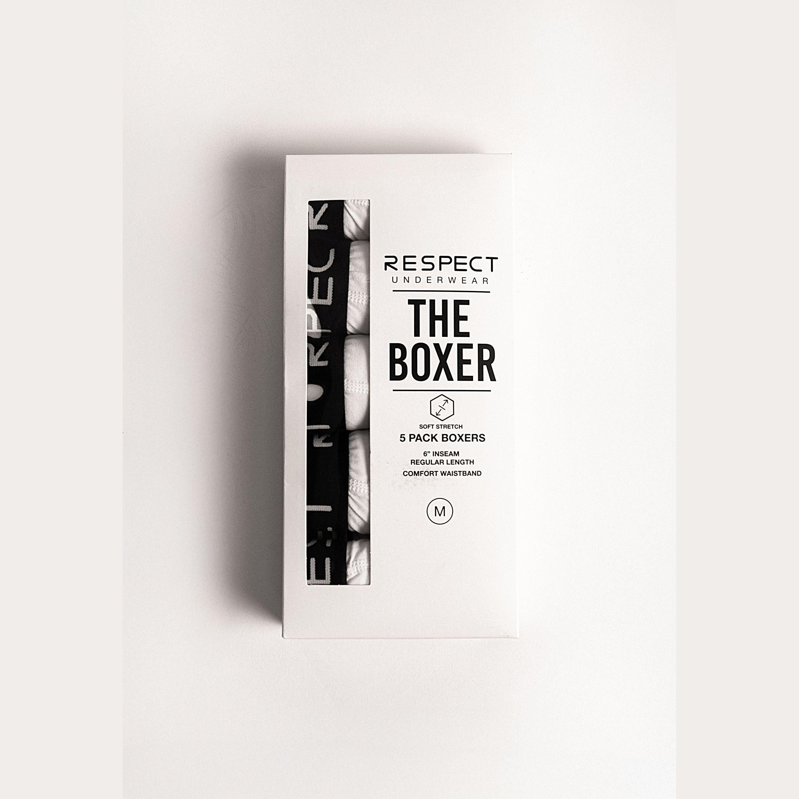 Single white boxer with black RESPECT waistband displayed flat against white background showing front view and construction details