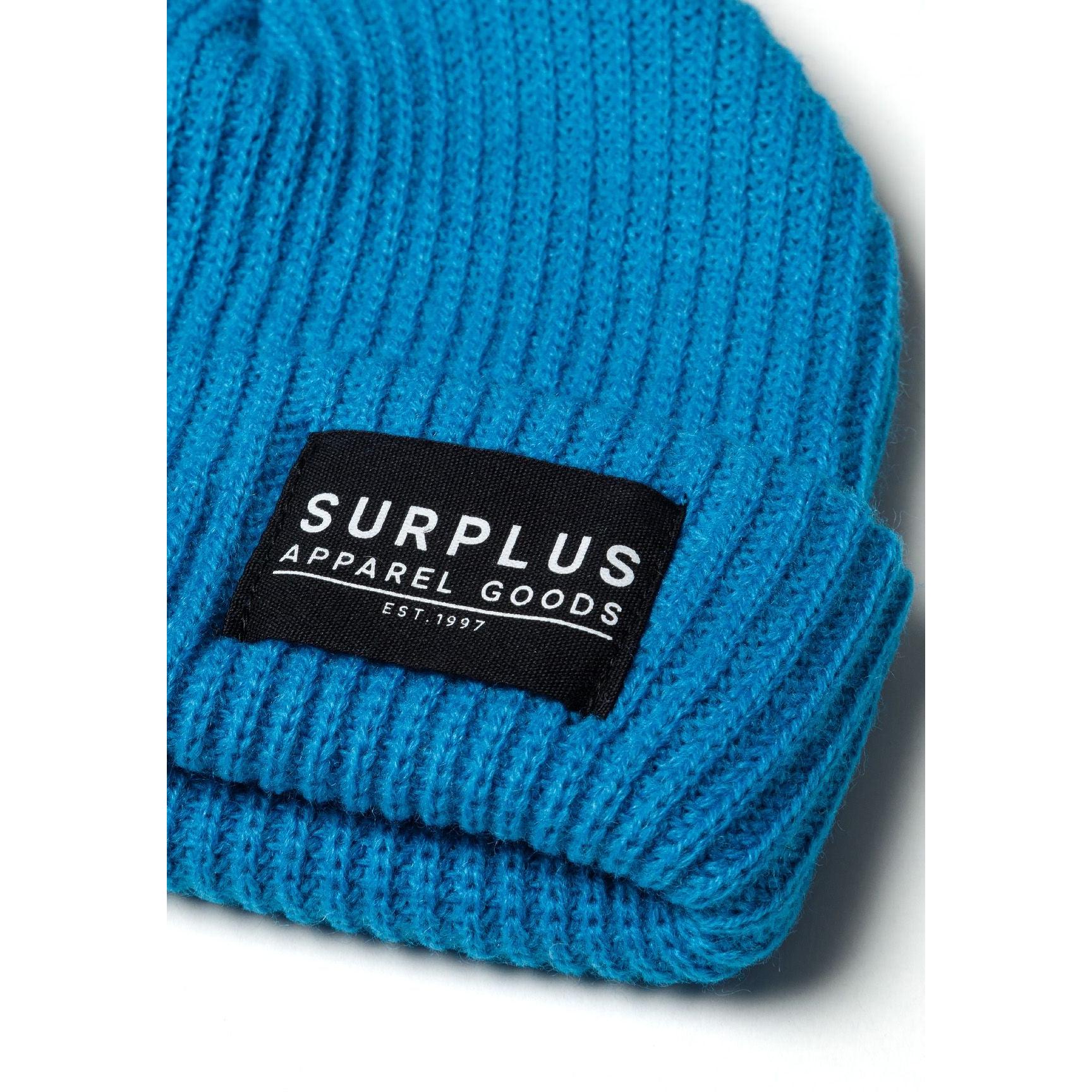 Detail view of black beanie fold-up cuff showing ribbed knit texture and construction quality