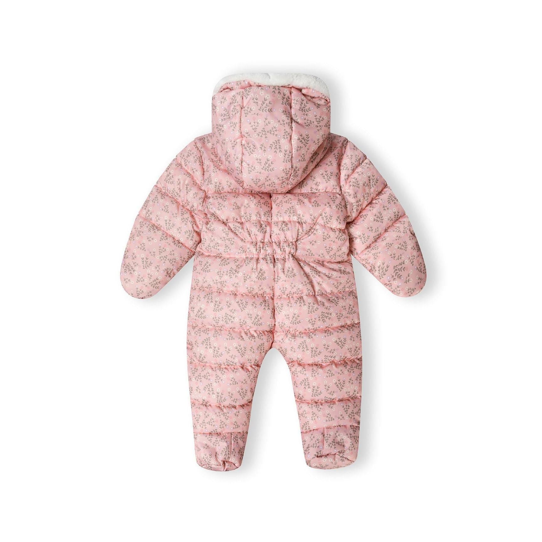 Close-up detail of baby snowsuit showing quilted texture and delicate floral pattern with built-in booties on white background