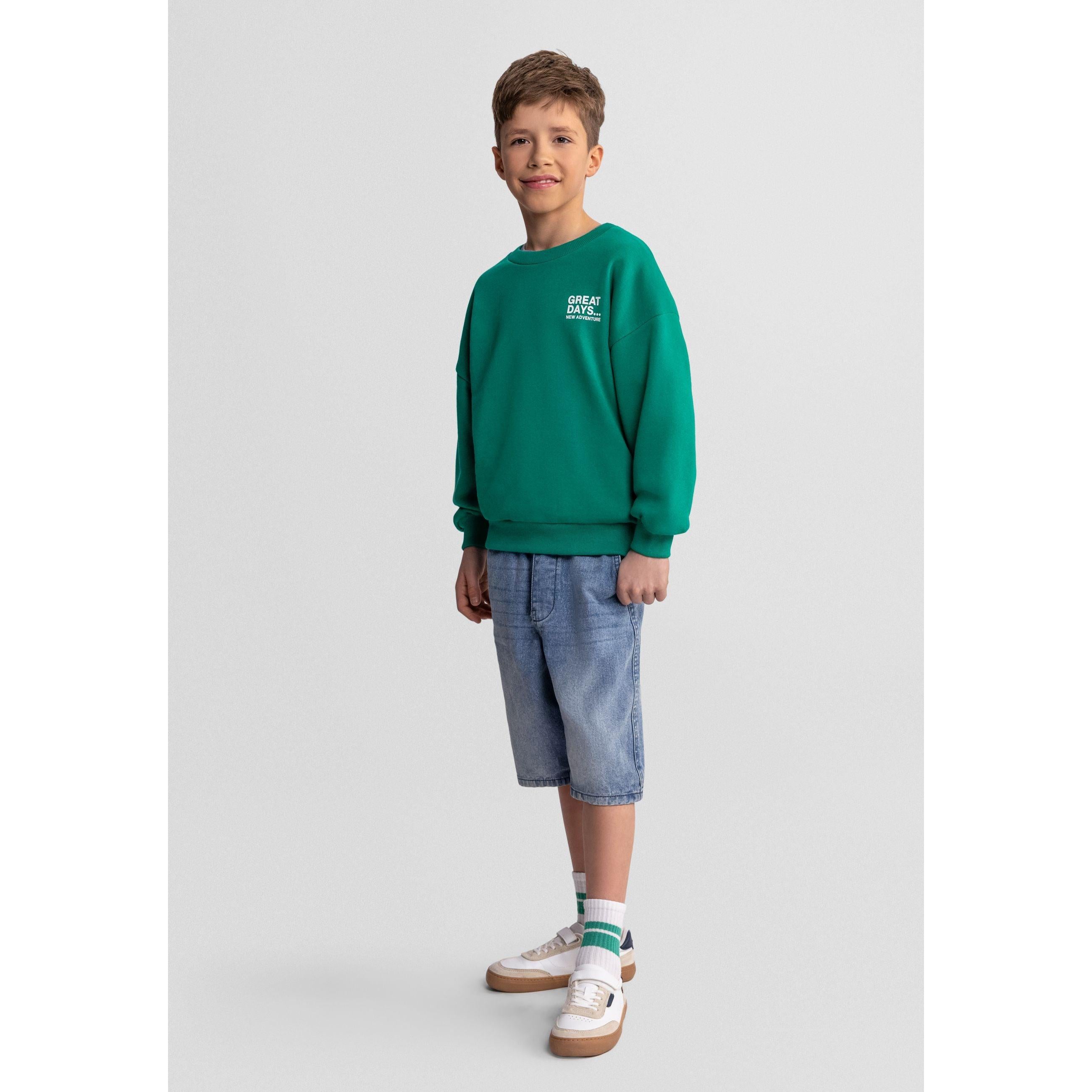 Back view of white sweatshirt showing plain design and ribbed detailing