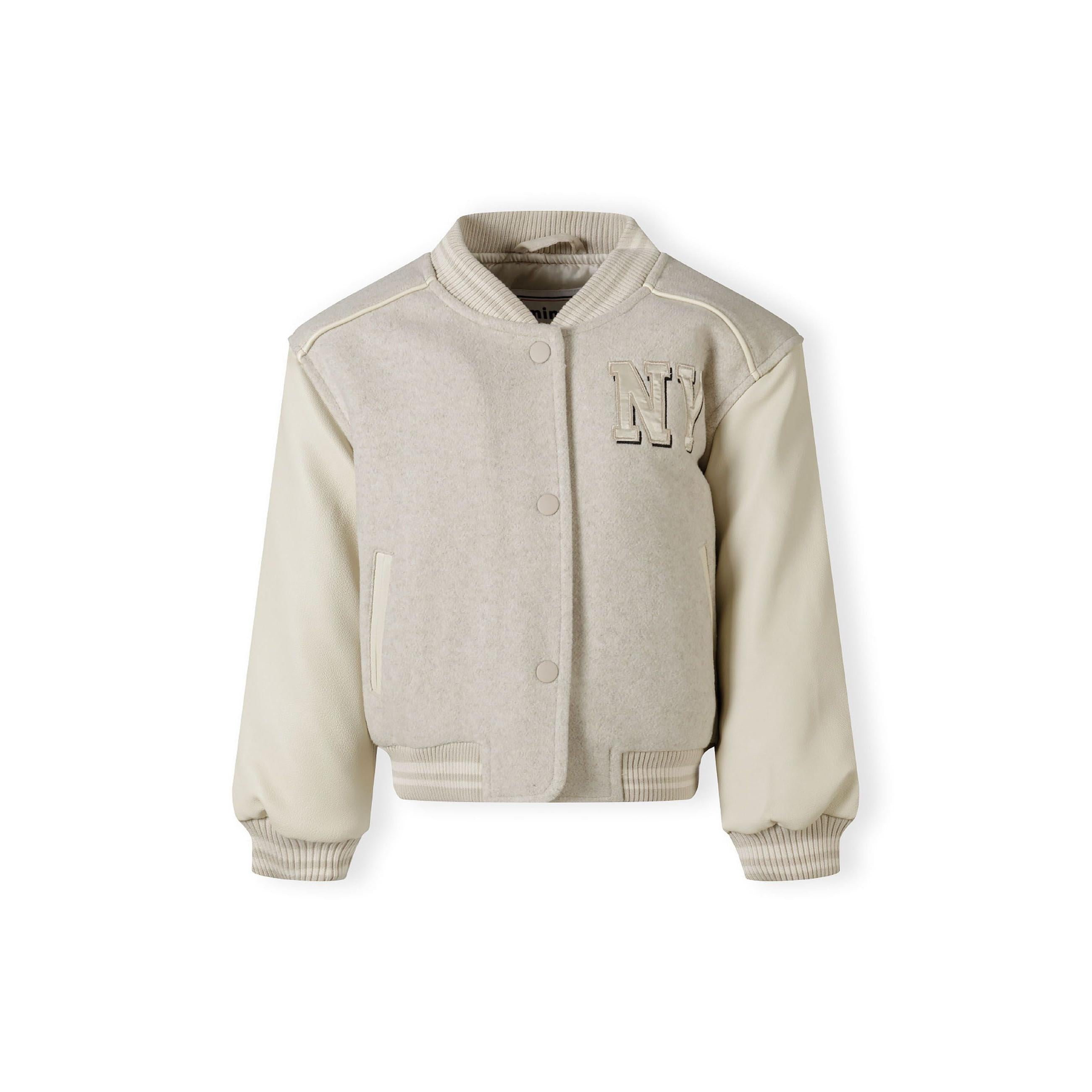 Back view of beige baseball jacket with faux leather sleeves showing ribbed collar and hem details on white background