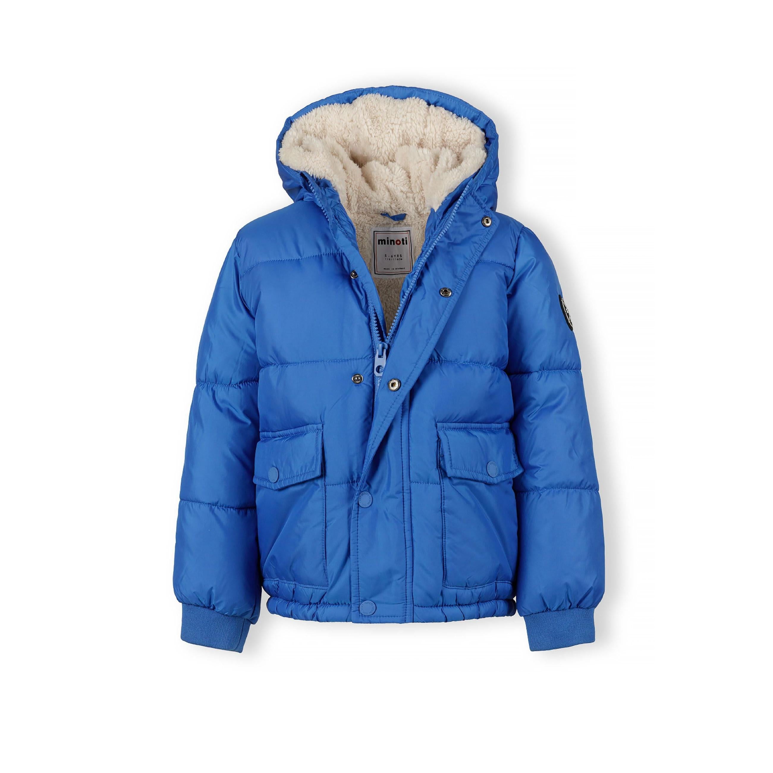 Cobalt blue hooded winter jacket laid flat showing teddy fleece lining, front pockets, and Minoti label against white background