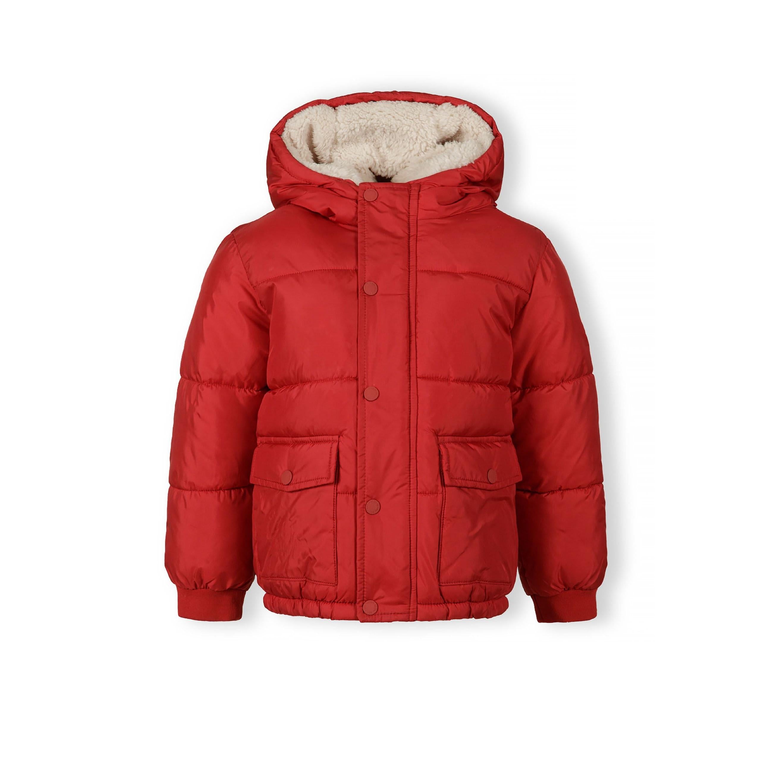 Red quilted winter jacket with teddy fleece lining visible inside hood, laid flat showing front pockets and snap closures